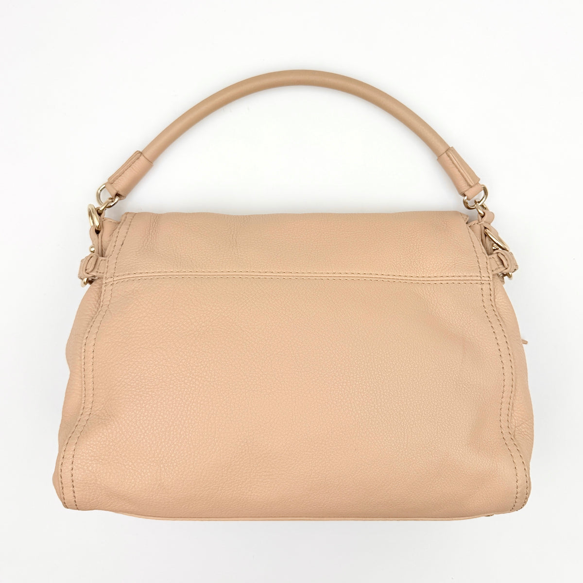 Kate Spade Cobble Hill Little Minka in beige pebbled leather with both top handle and detachable strap displayed.