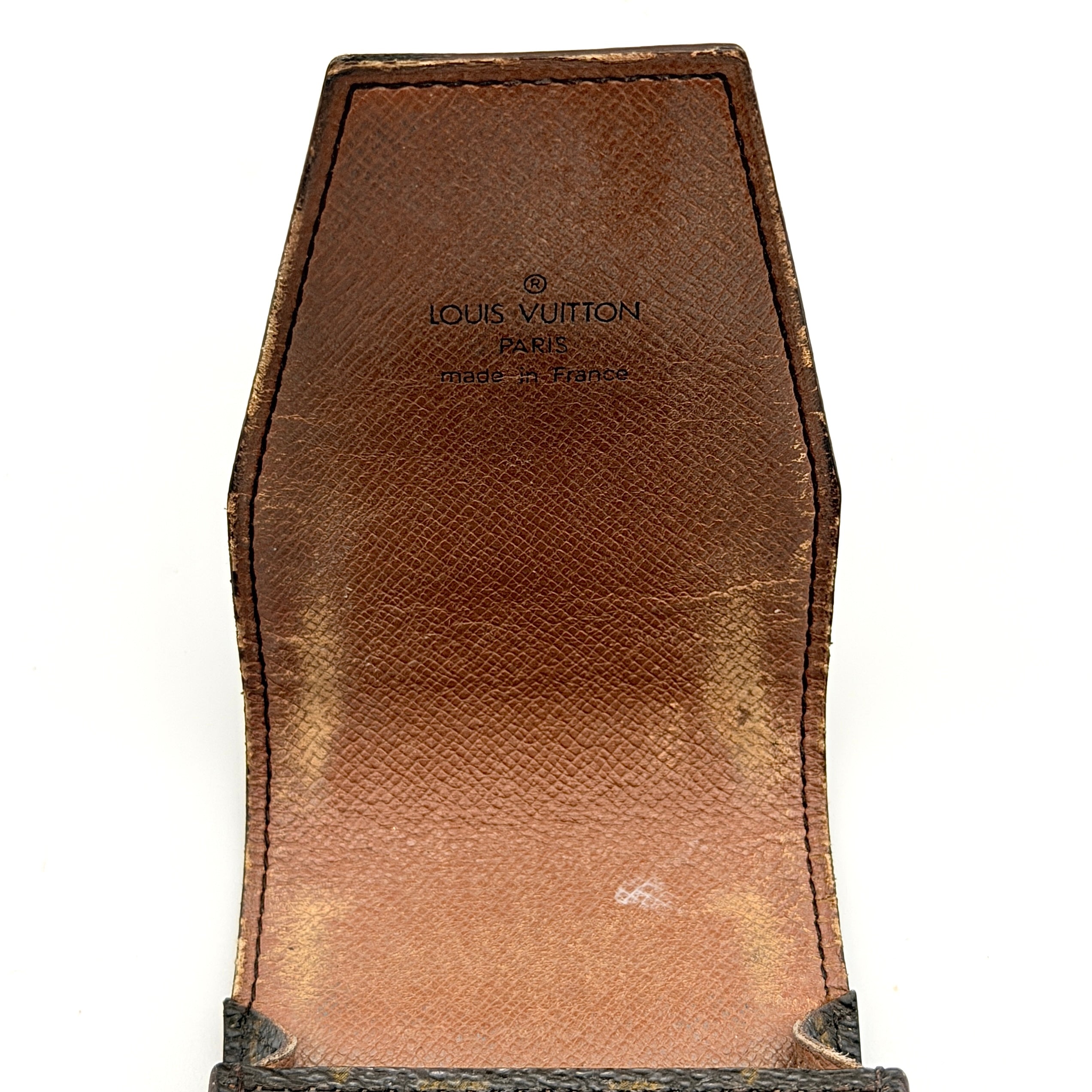 Louis Vuitton Monogram cigarette case in brown coated canvas with flap top, shown from the front.