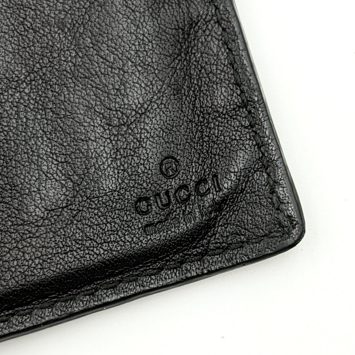 Gucci Guccissima GG embossed long wallet in black leather with box and care card.