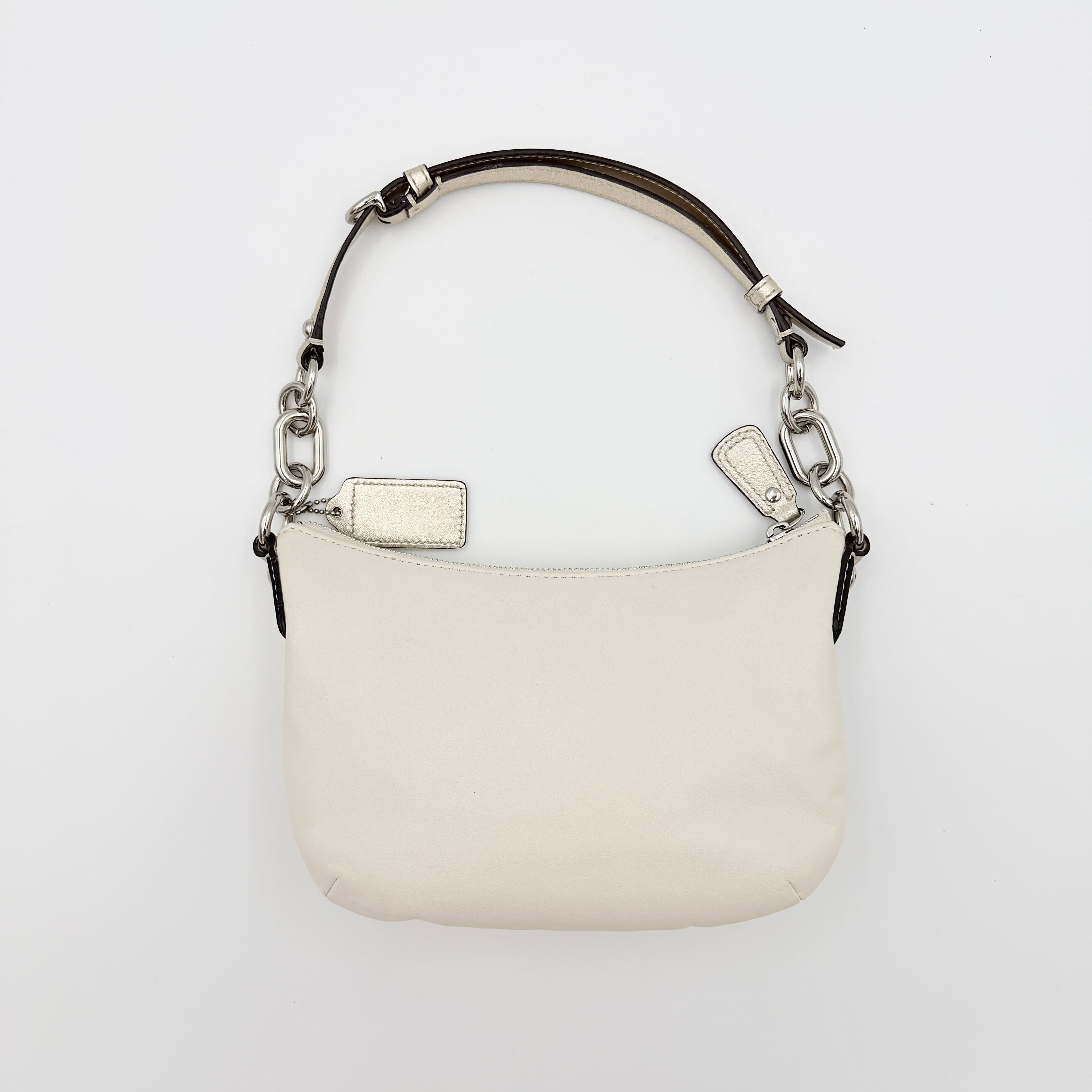 Coach Kristin Hobo Shoulder Bag in ivory leather with silver-tone hardware and a structured short strap.
