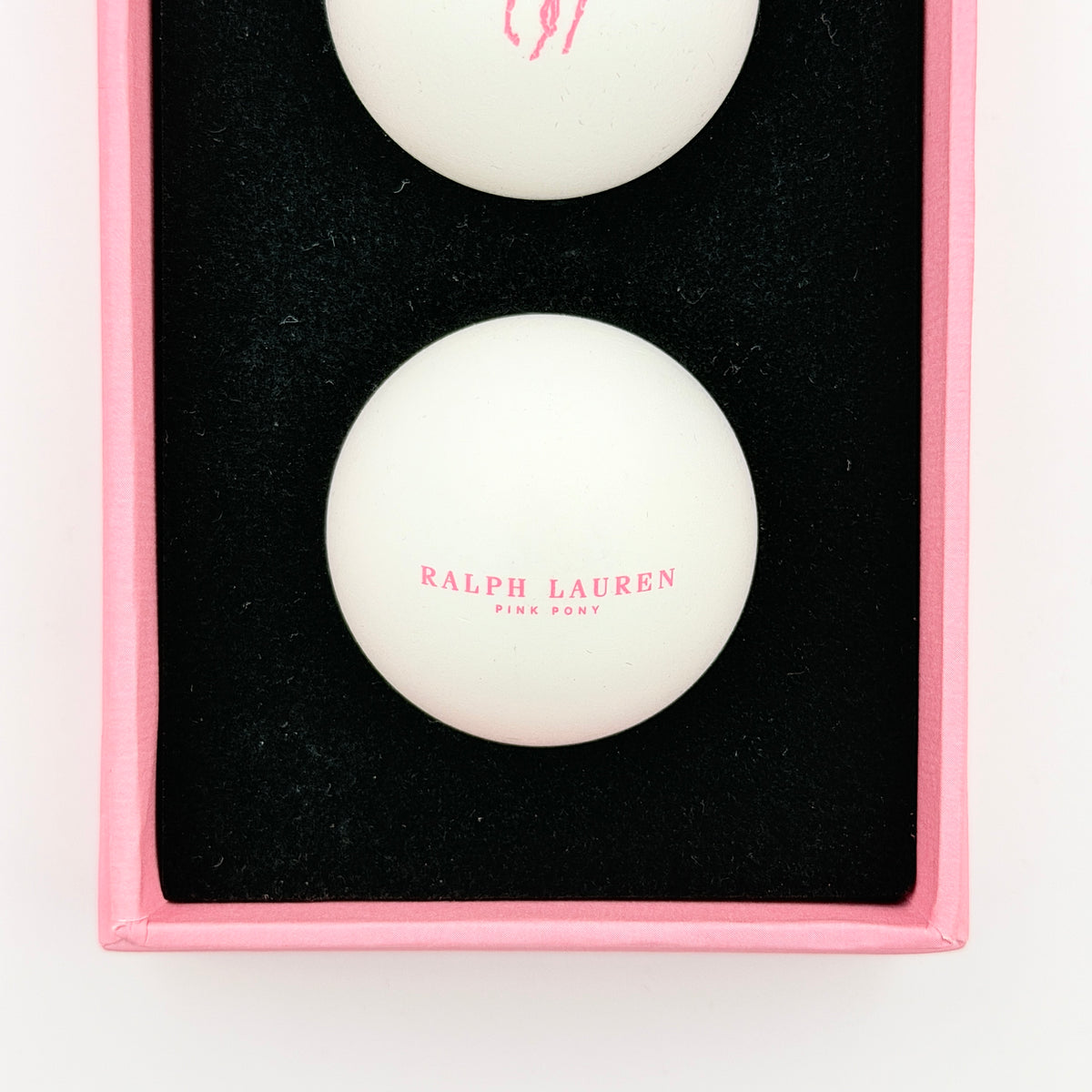 Ralph Lauren Pink Pony table tennis balls set of three, presented in a pink gift box with signature Polo designs.