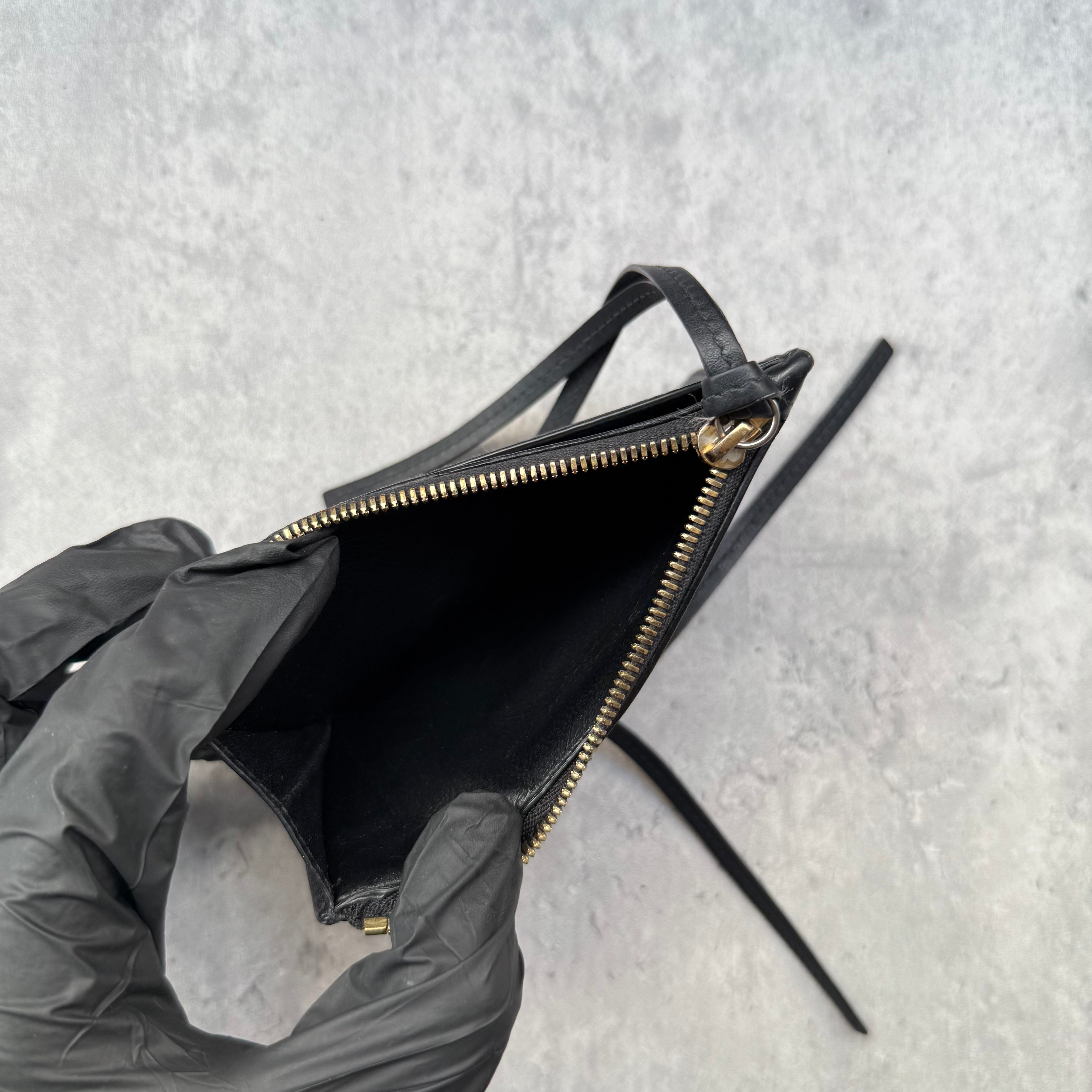 Balenciaga Neo Classic Zip Card Holder in black leather with gold-tone zip detail and moto-style front pocket