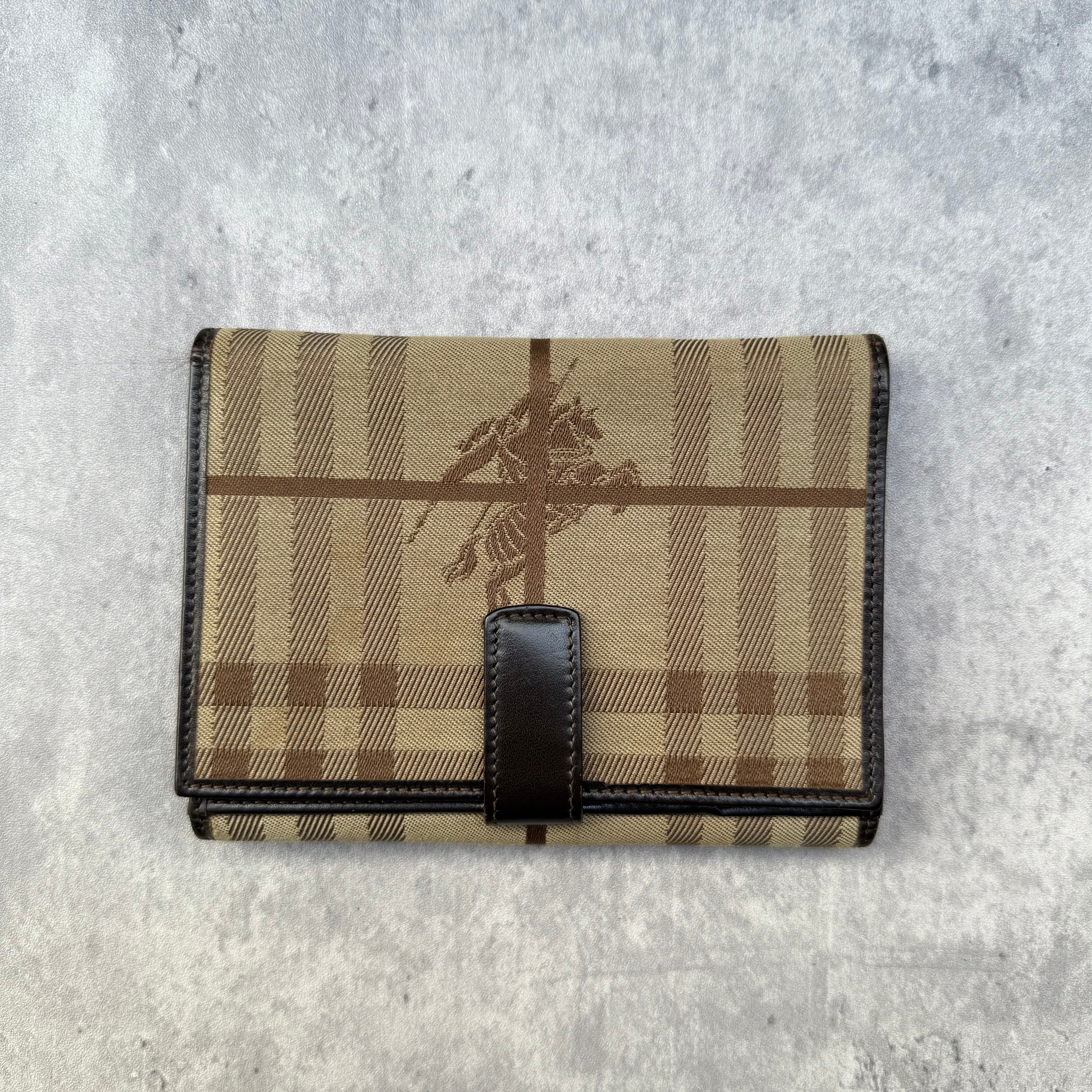 Burberry Nova Check Wallet in beige tartan canvas with brown leather trim, fold-out design, and multiple compartments.