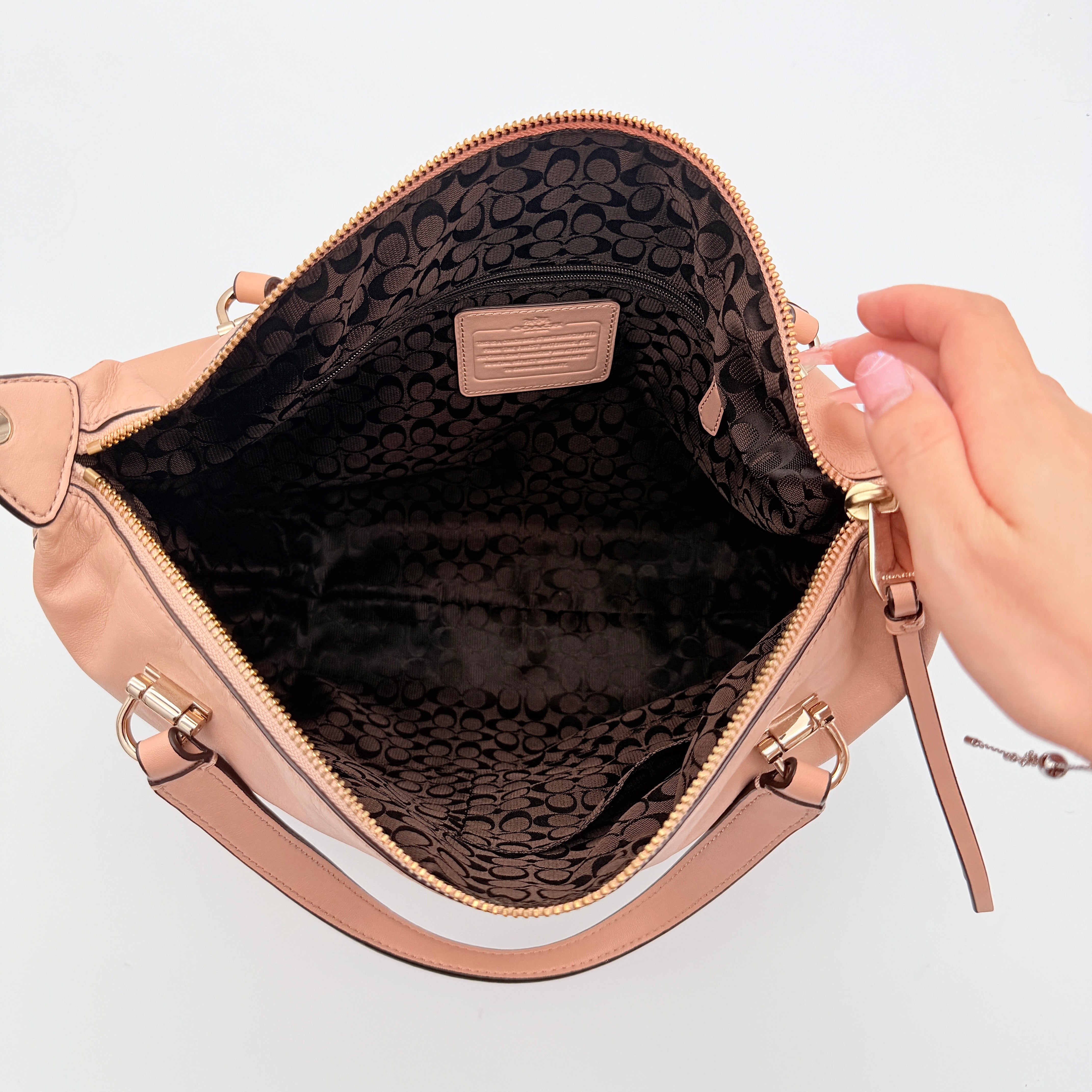 Coach Madison Smythe Satchel in blush pink leather with gold-tone hardware and detachable strap.