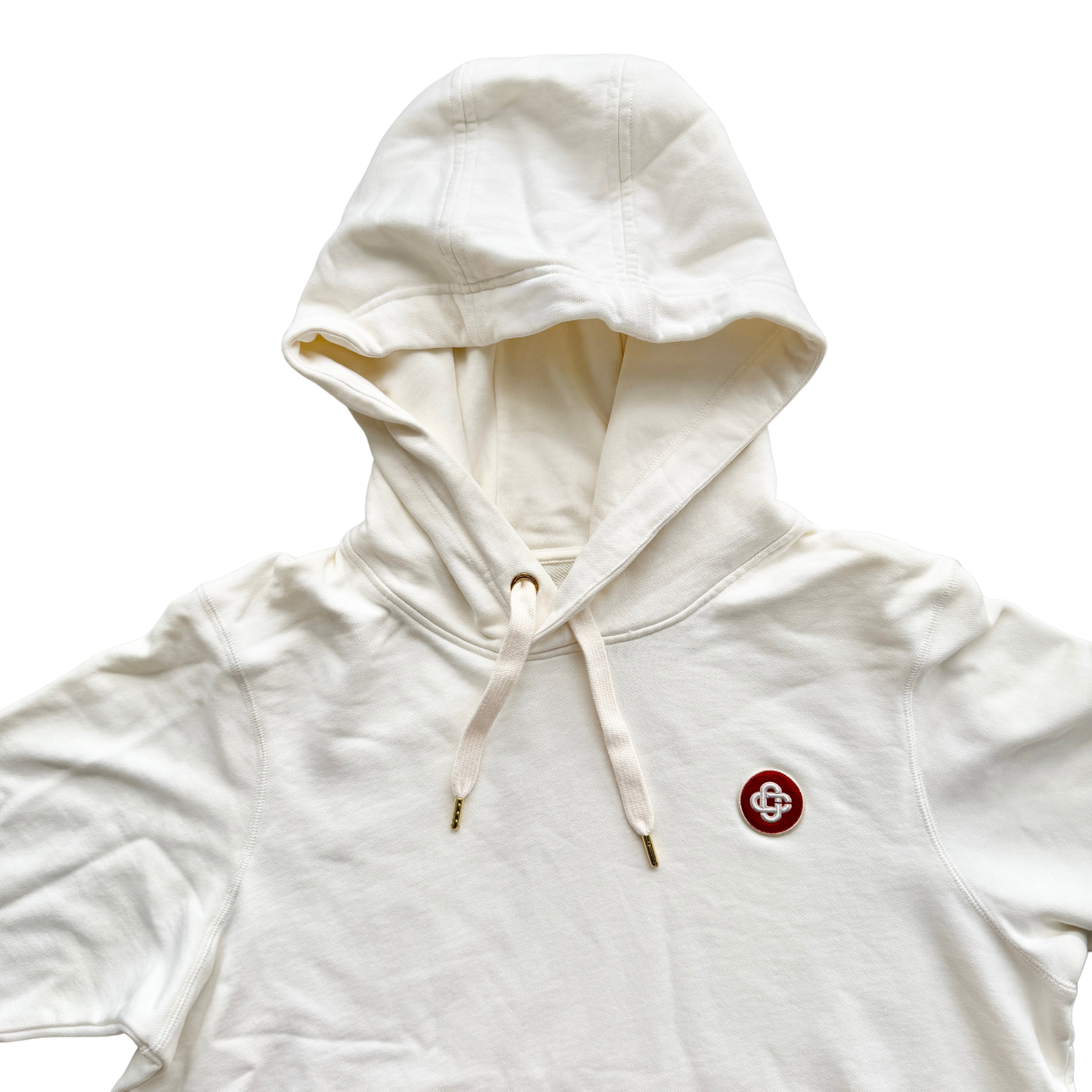 Casablanca off-white hoodie with a red logo patch and kangaroo pocket, laid flat and showing the front view.