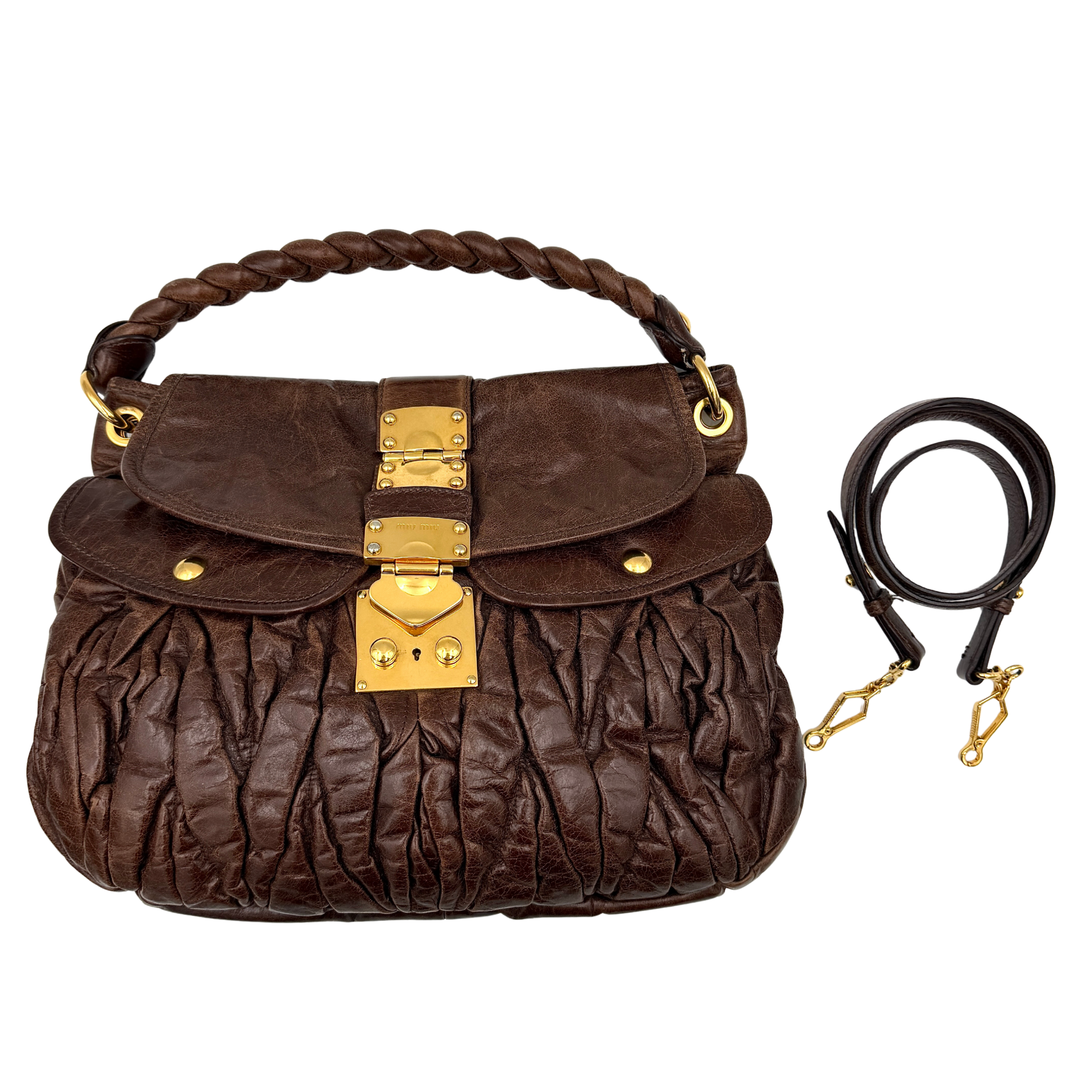 Miu Miu Coffer Hobo bag in deep brown matelassé leather with braided handle, gold hardware, and detachable strap.