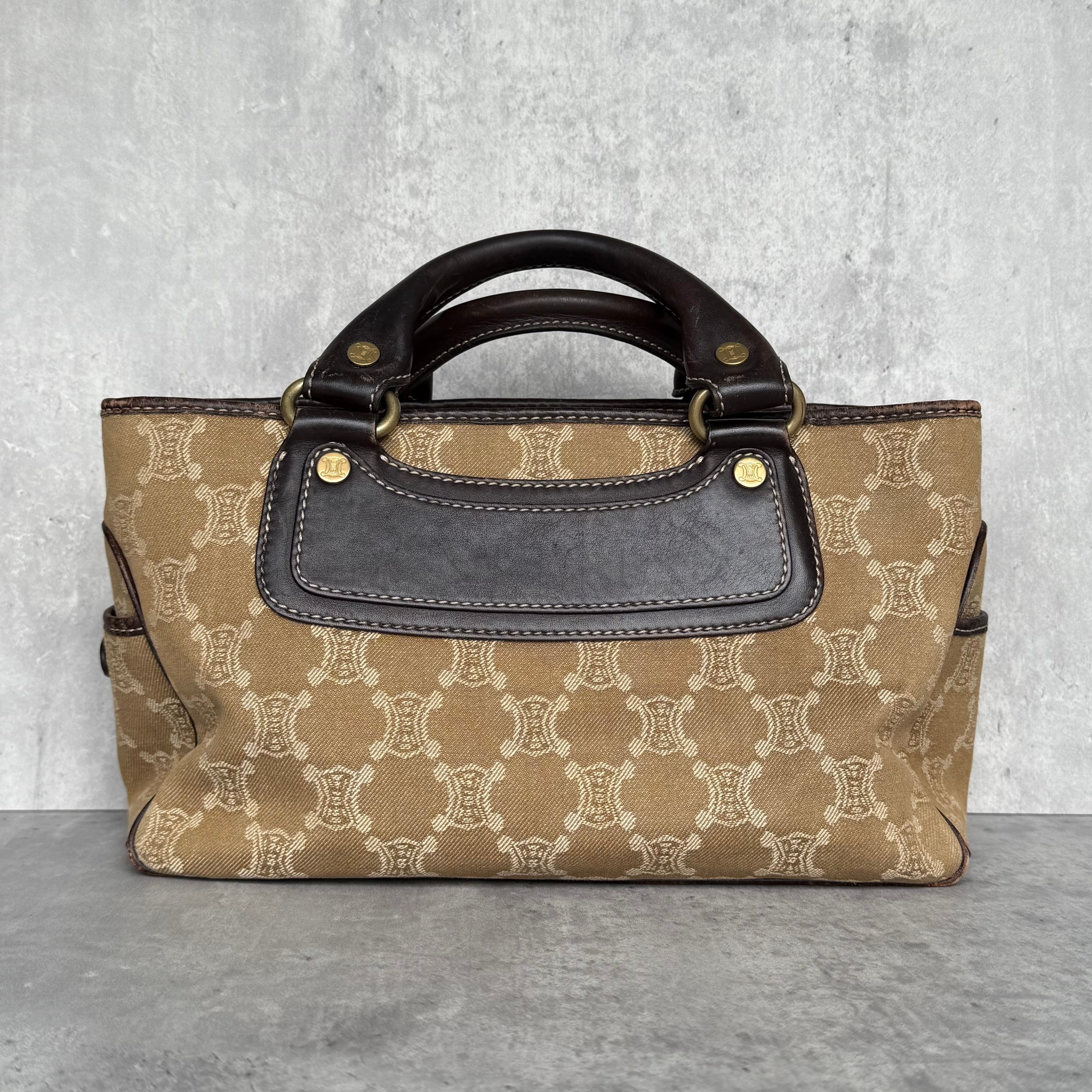 Celine Macadam Boogie Handbag in beige canvas with brown leather trim, gold hardware, and dual rolled handles