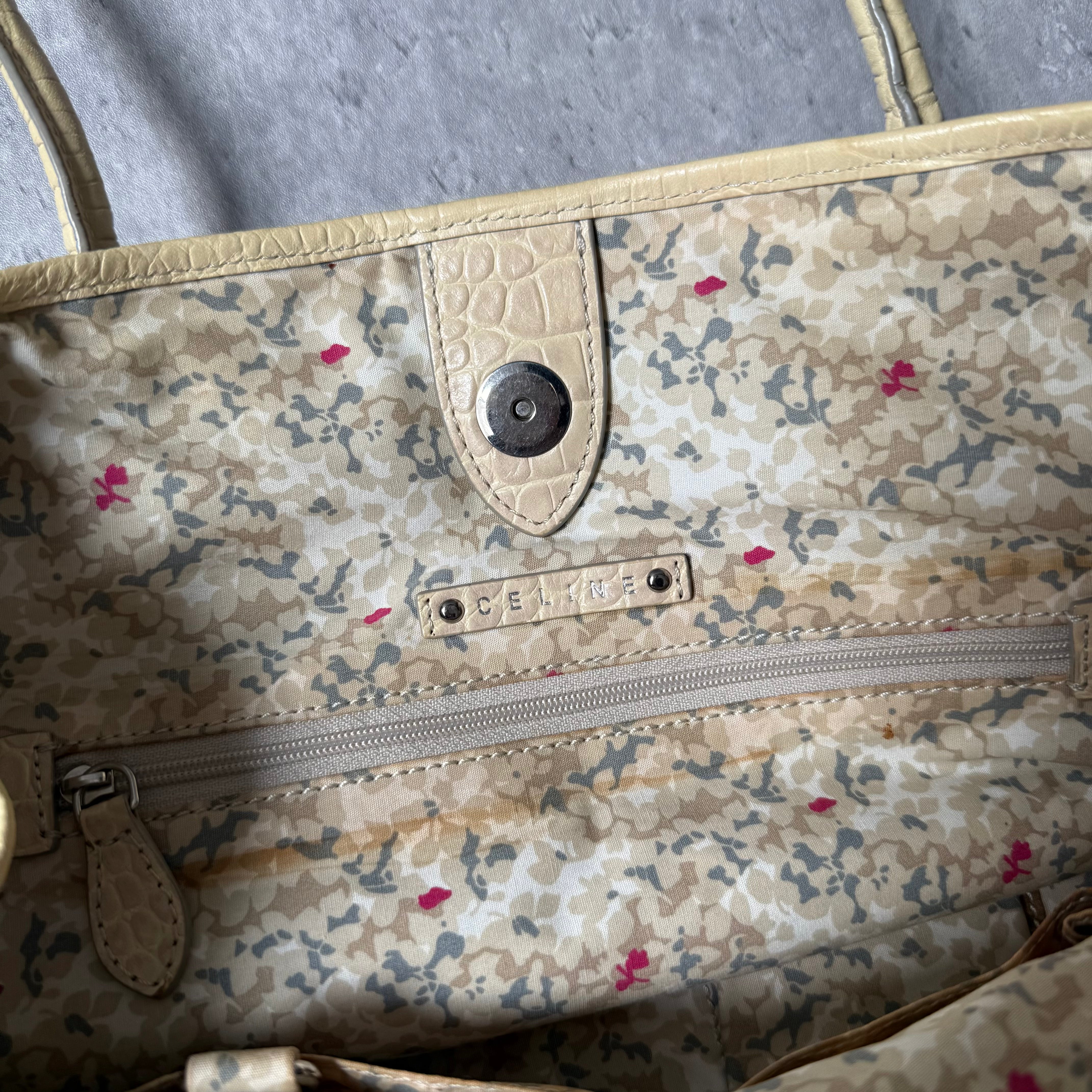 Celine Macadam Gradient Denim Shoulder Bag with beige leather trim, logo print, floral interior lining, and dual handles.