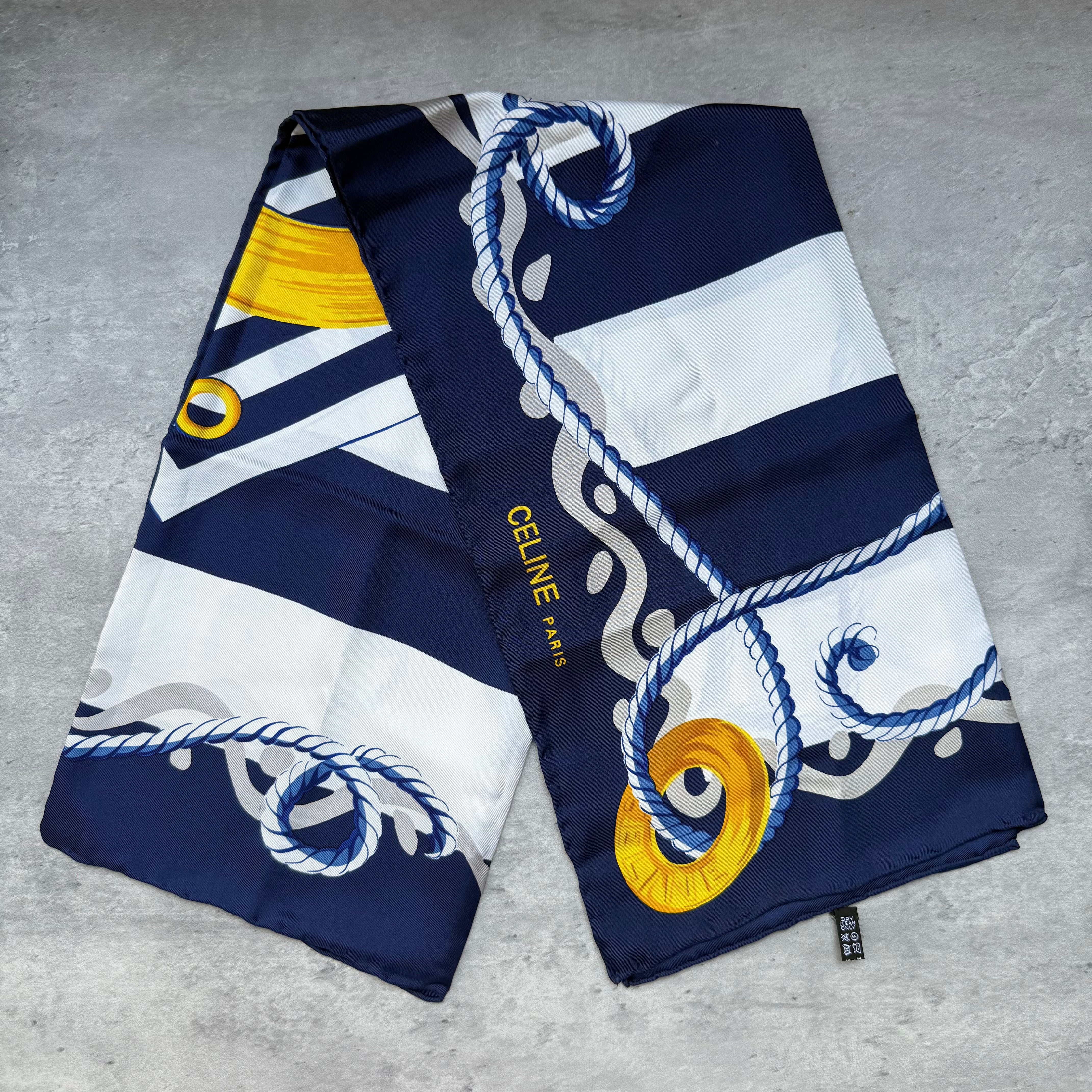 Celine Paris Silk Scarf Navy Blue with yellow rope and emblem design, crafted from smooth silk.