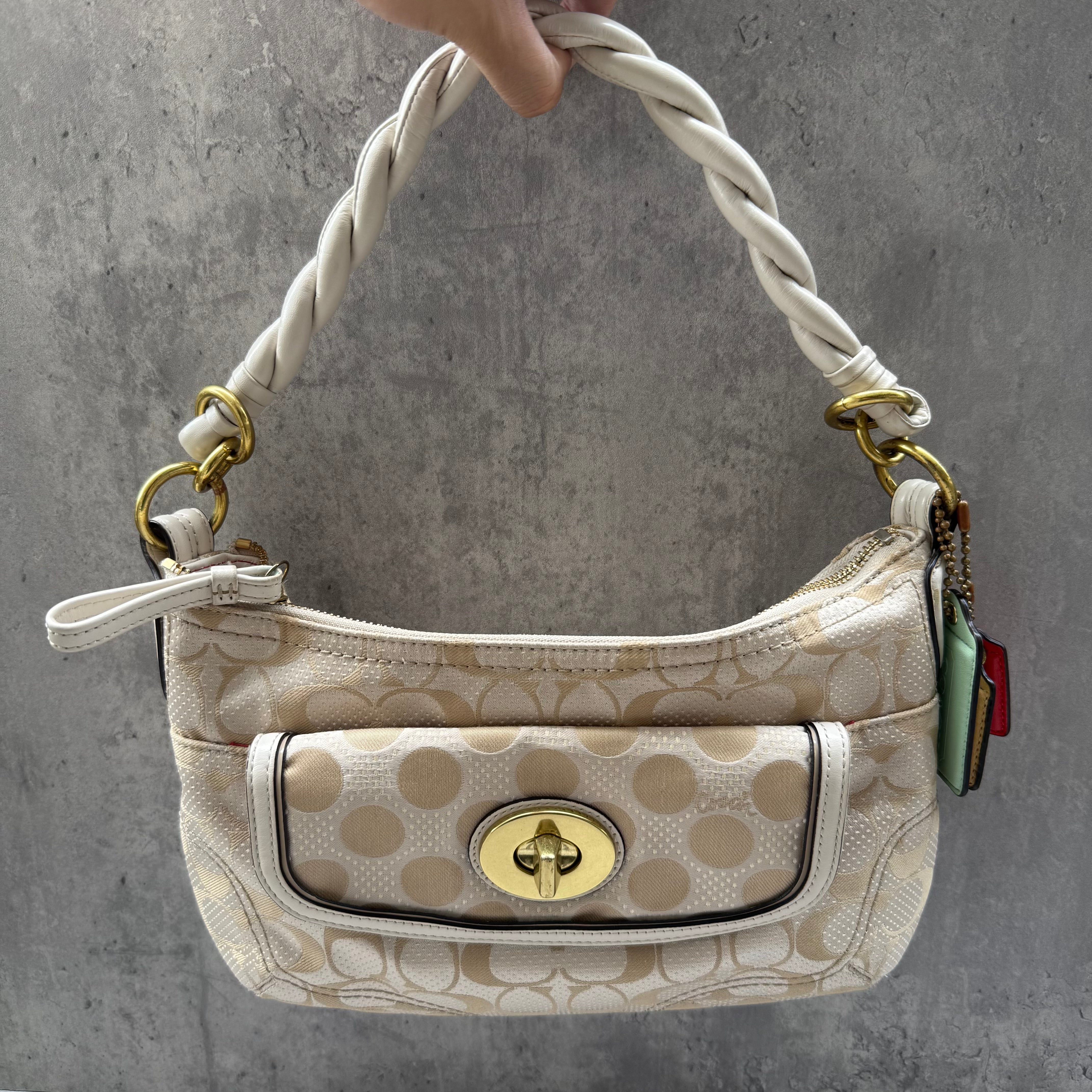Coach 2Way Signature Dot Satin Canvas Shoulder Bag in beige with braided handle, turn-lock pocket, colorful hang tags, and red interior