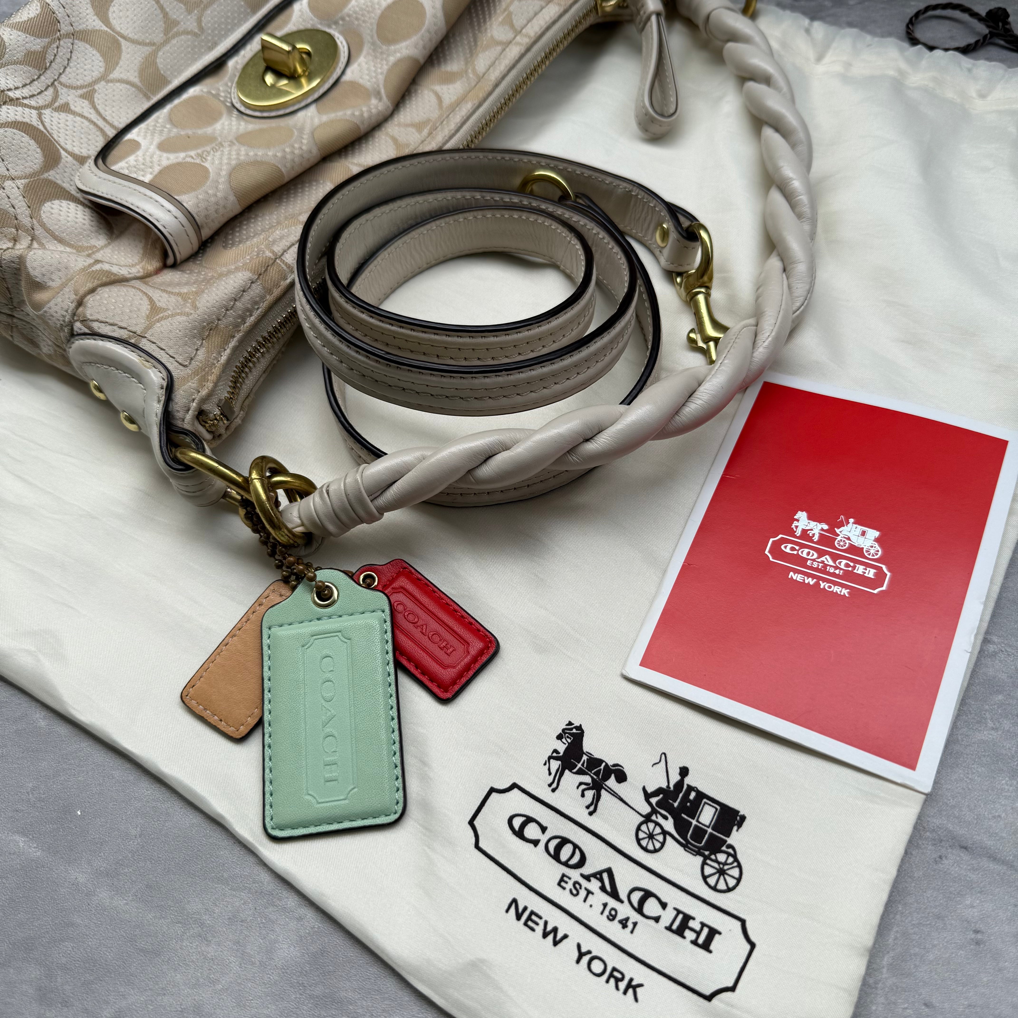 Coach 2Way Signature Dot Satin Canvas Shoulder Bag in beige with braided handle, turn-lock pocket, colorful hang tags, and red interior