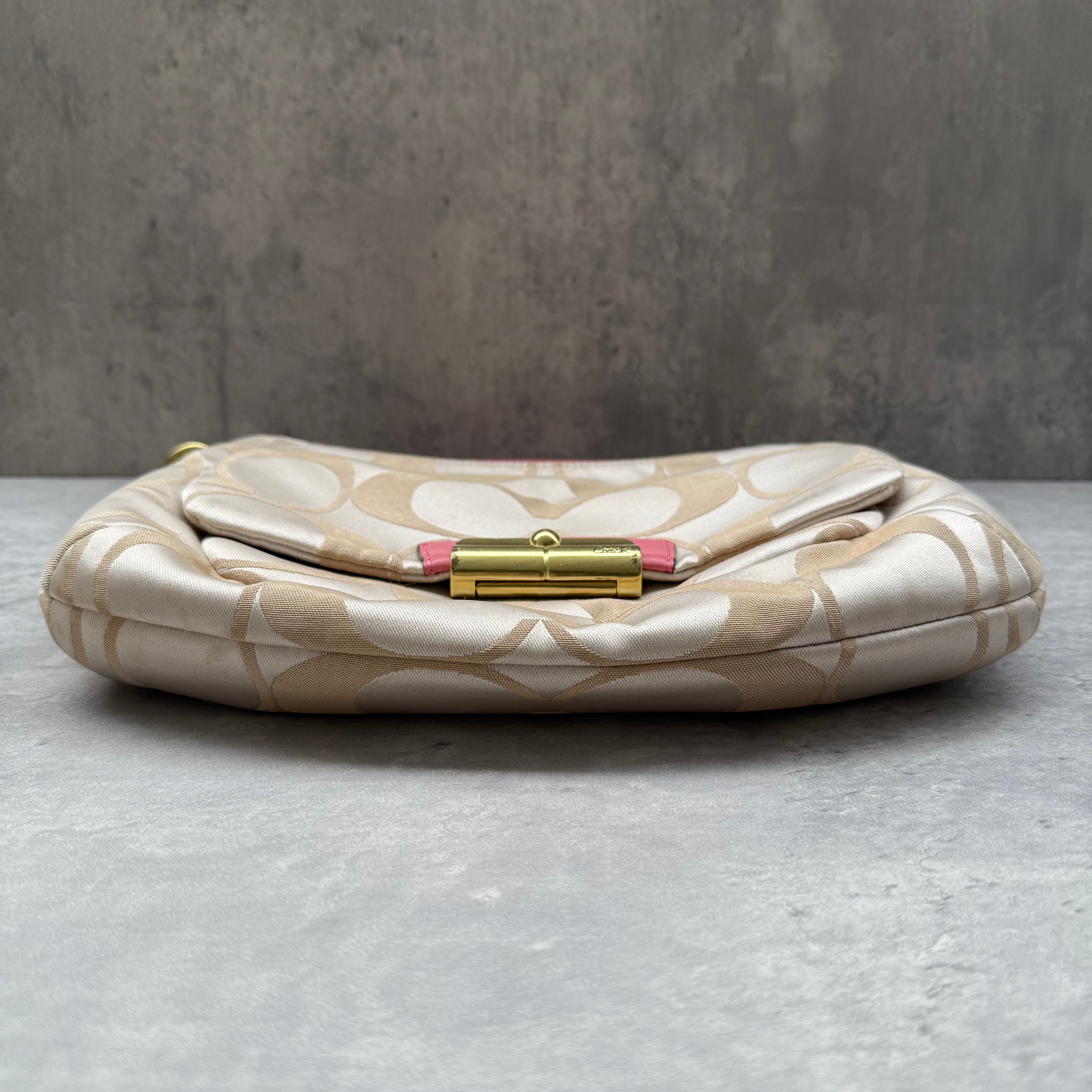 Coach 2Way Signature Shoulder Bag Cream/Pink with gold-tone turn-lock, pink leather trim, and cream monogram canvas