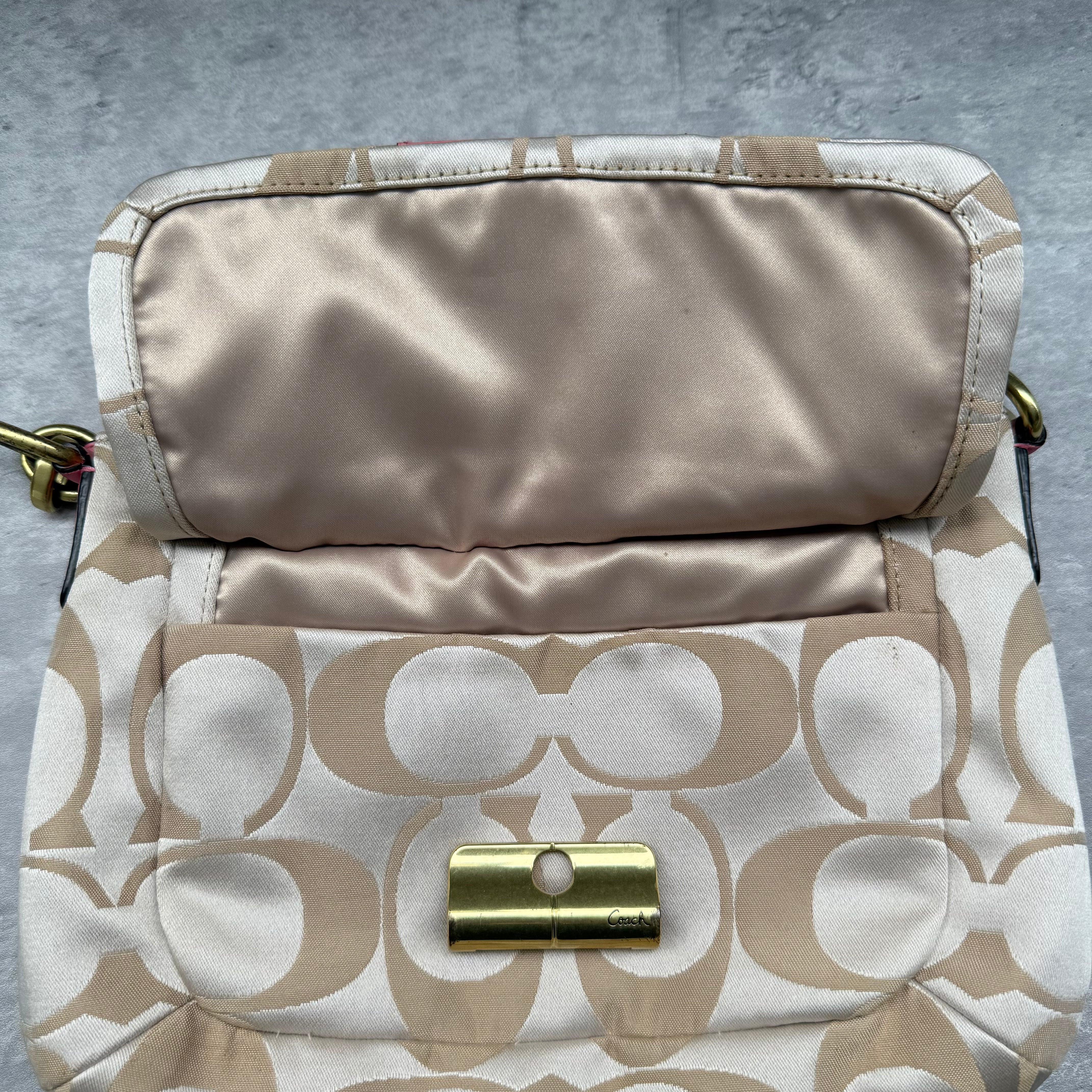 Coach 2Way Signature Shoulder Bag Cream/Pink with gold-tone turn-lock, pink leather trim, and cream monogram canvas