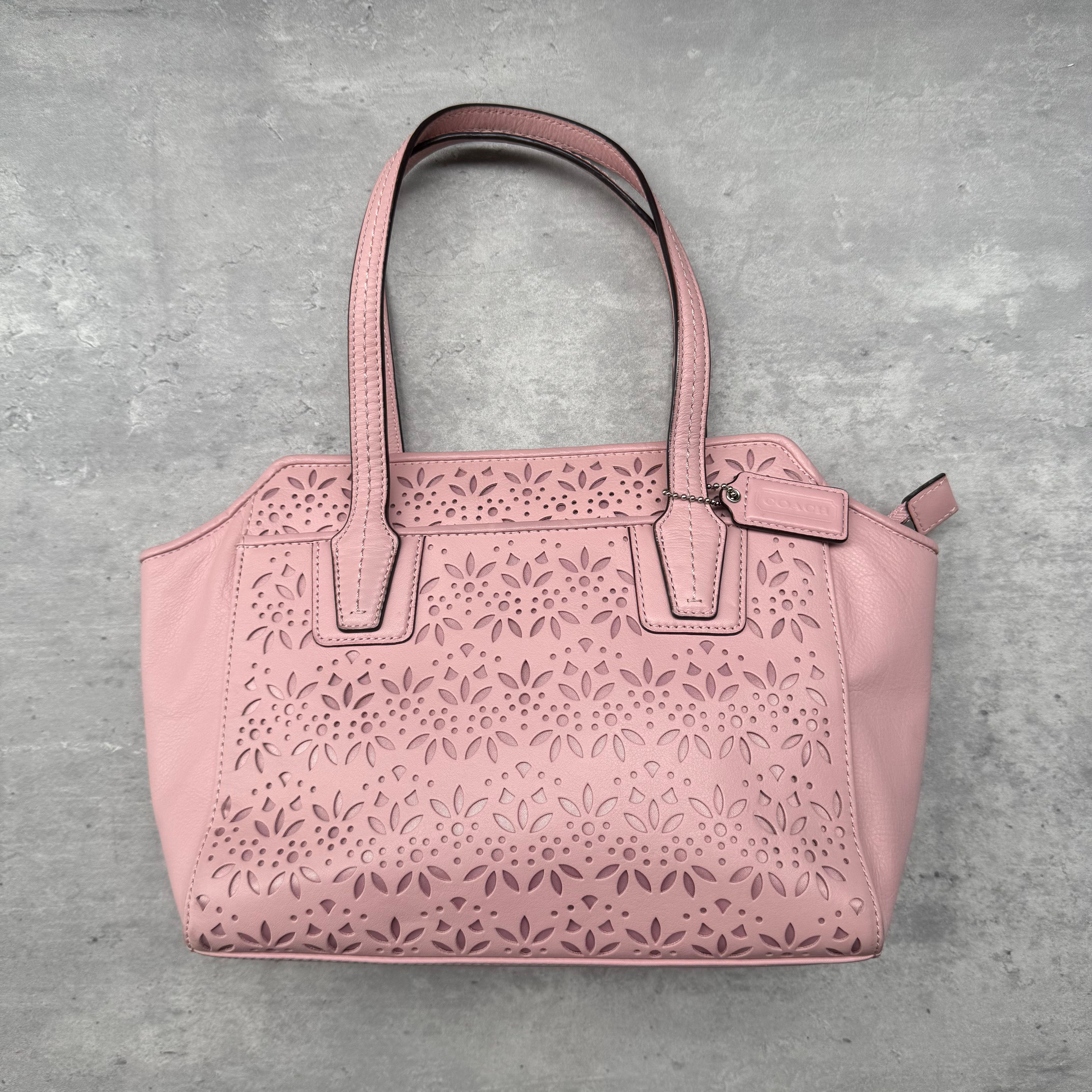 Coach 2Way Taylor Eyelet Bette Mini Tote Bag in pink leather with floral eyelet detailing, featuring three compartments and silver-tone hardware.