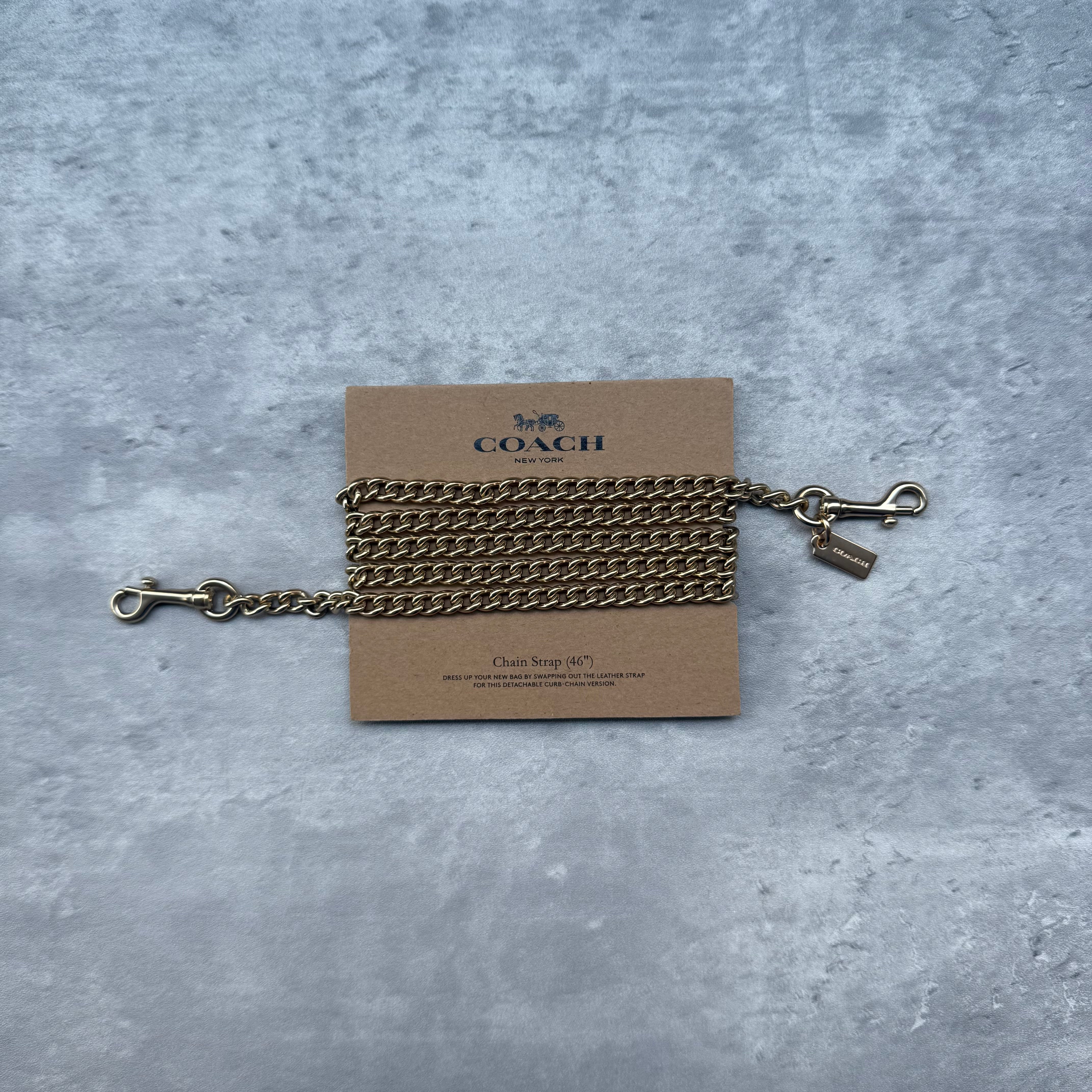 Coach Chain Strap Gold, 46-inch length with dog clip clasps and Coach logo tag.