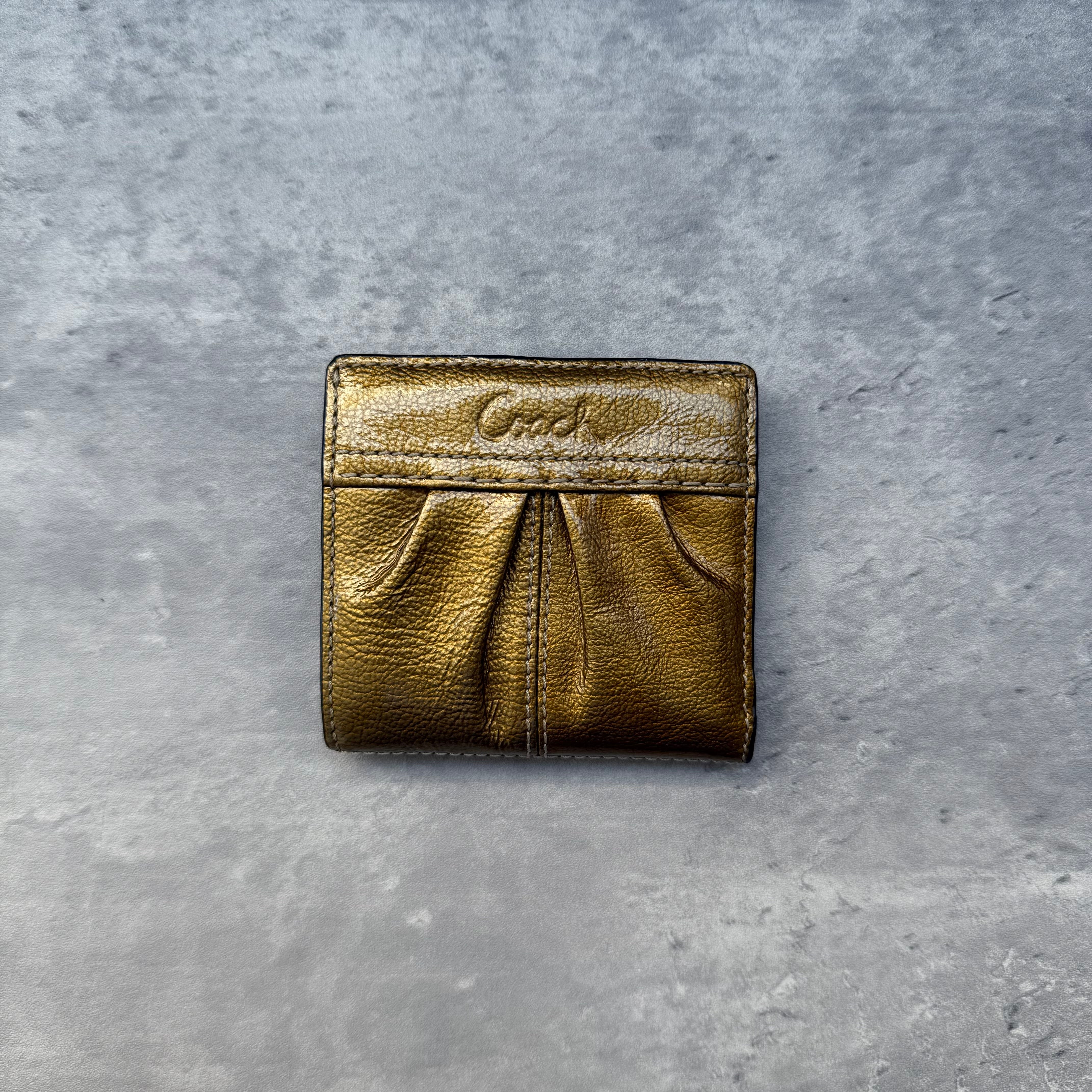 Coach Gold Metallic Small Wallet in leather with front pleating, rear zip pocket, card slots, and snap closure