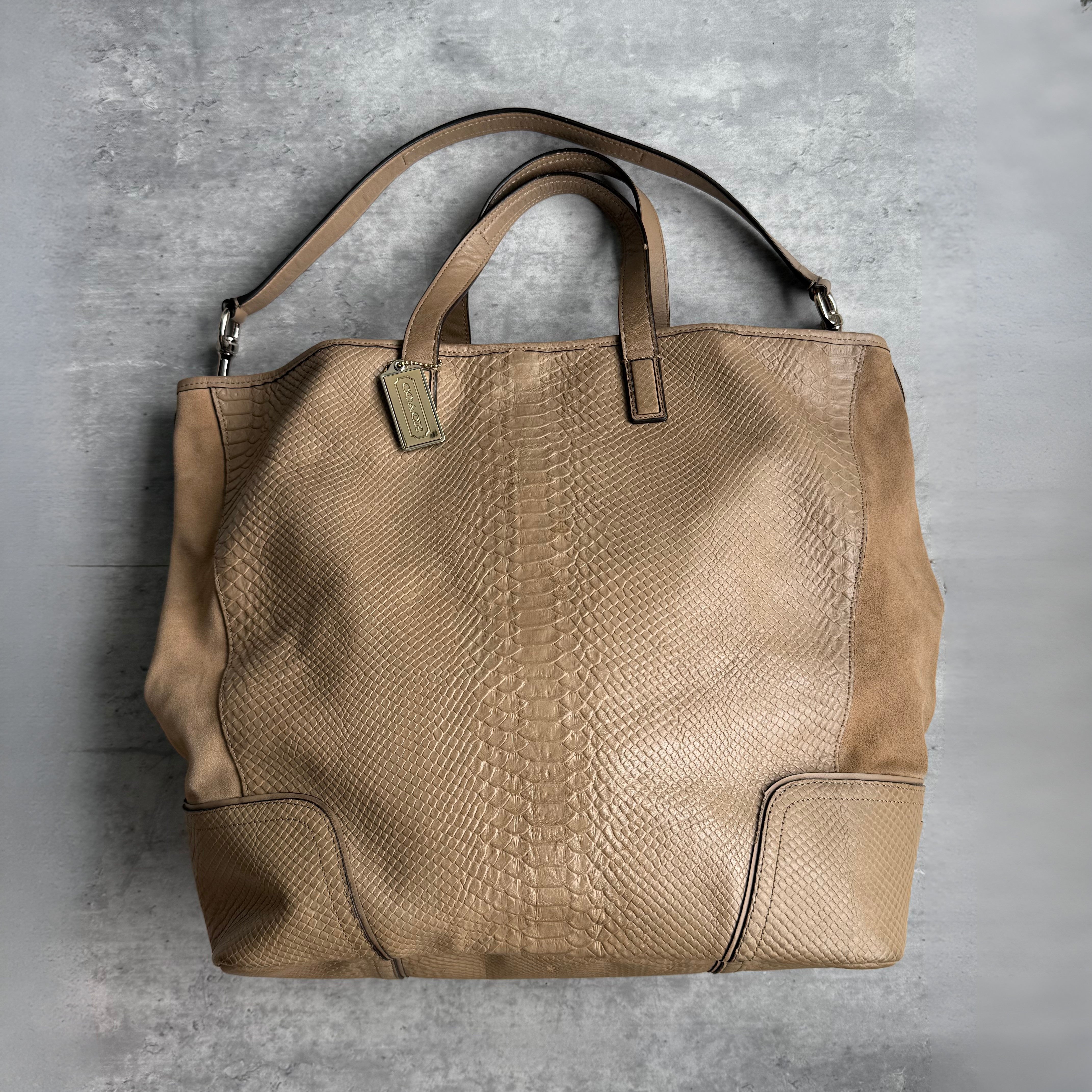 Coach Hadley XL Tote Bag in tan python-embossed leather with dual handles, clip closure, and spacious interior.