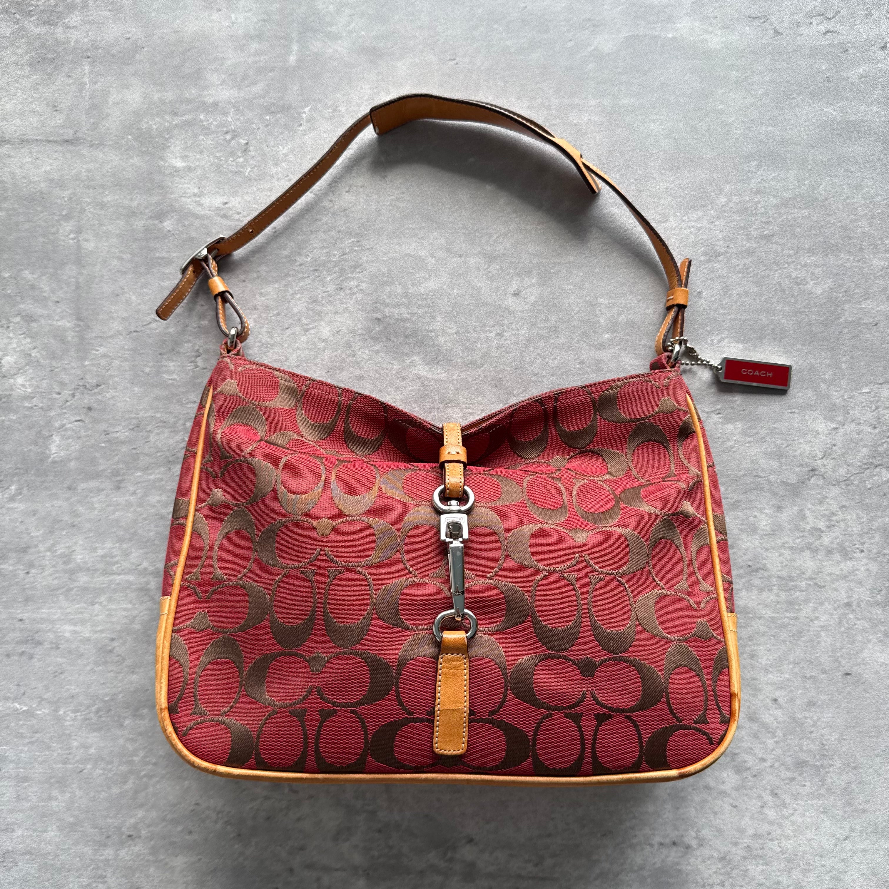 Coach Hobo Signature Clip Canvas Handbag in red and beige with jacquard canvas, leather trim, and silver-tone hardware.