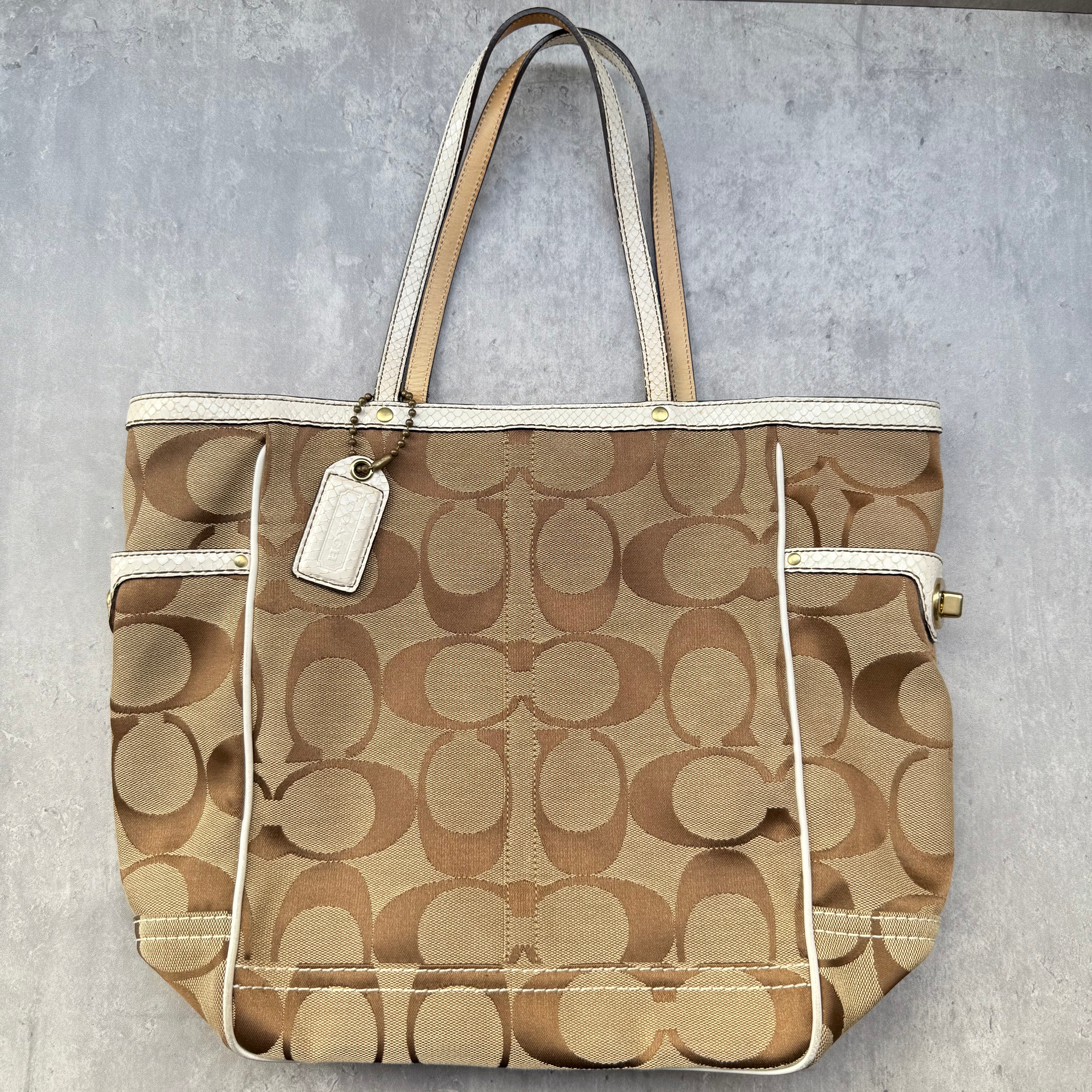 Coach Jacquard Python Canvas Shoulder Bag in tan with ivory snake-embossed leather trim and zip closure