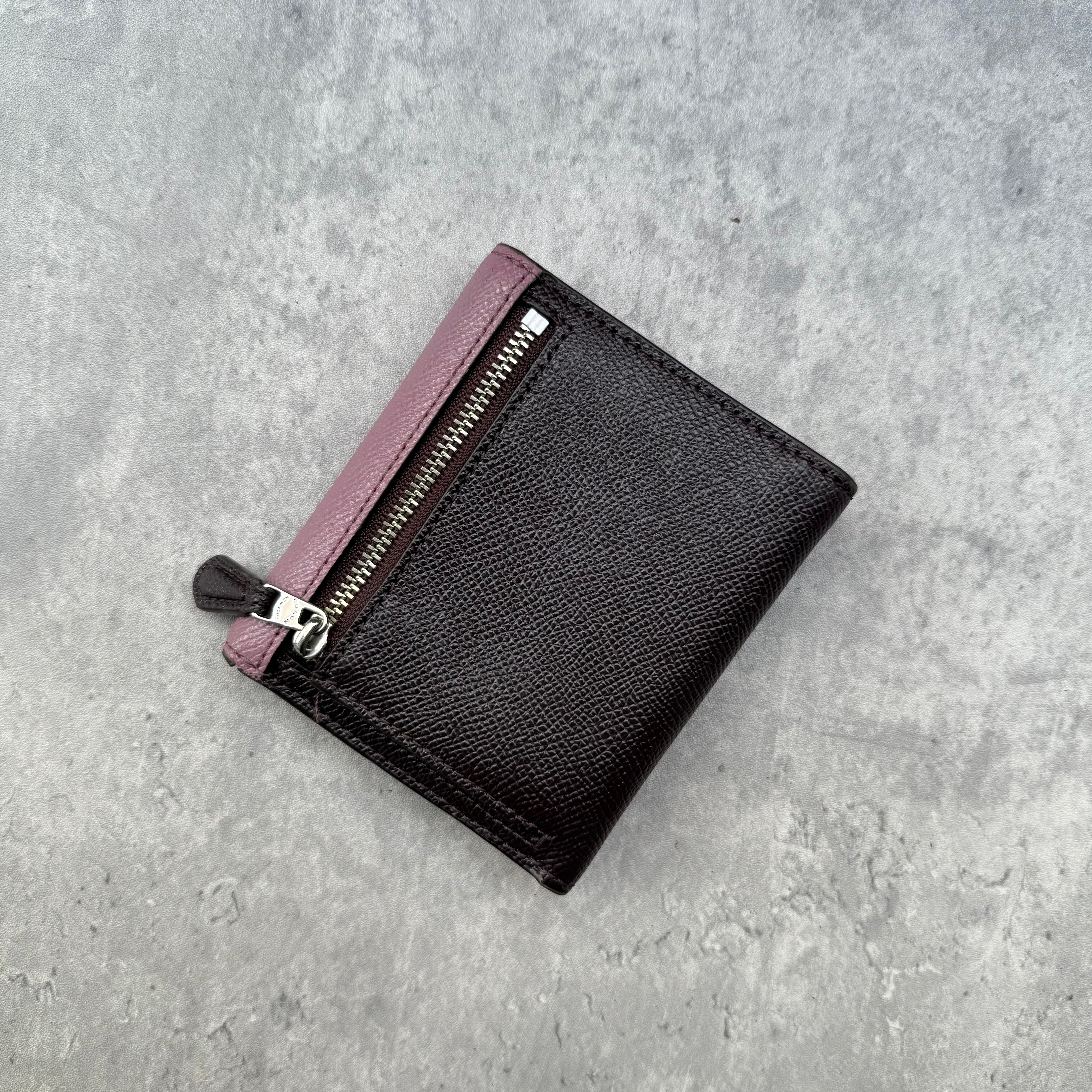 Coach Jasmine Colour-Block Small Wallet in plum, burgundy, and black pebbled leather with zip coin pocket