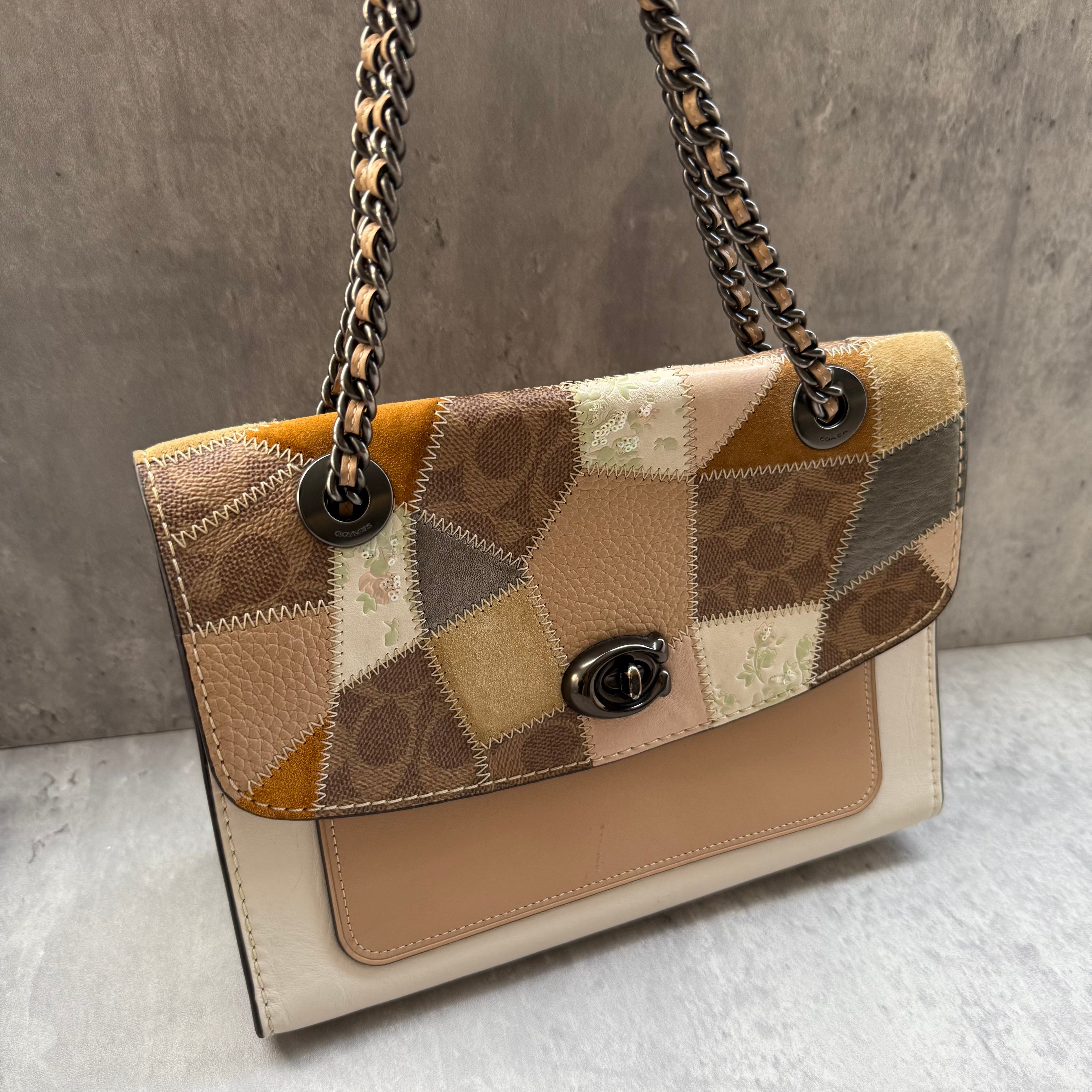 Coach Parker Multi Patch Shoulder Bag with monogram canvas, suede, leather panels, yellow suede lining, and chain leather strap.