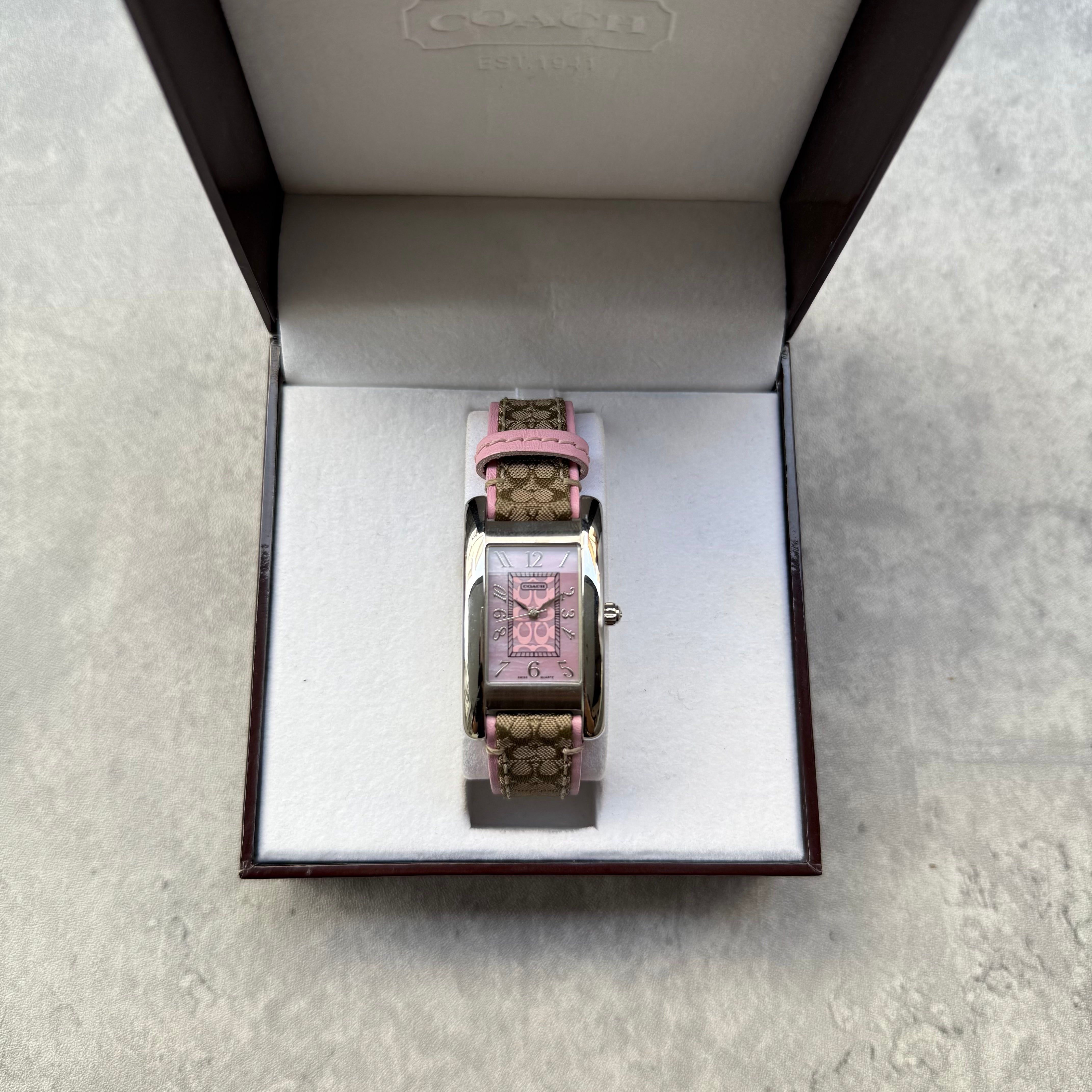 Coach Signature Canvas Watch with Pink Dial, featuring monogram strap and original Coach box