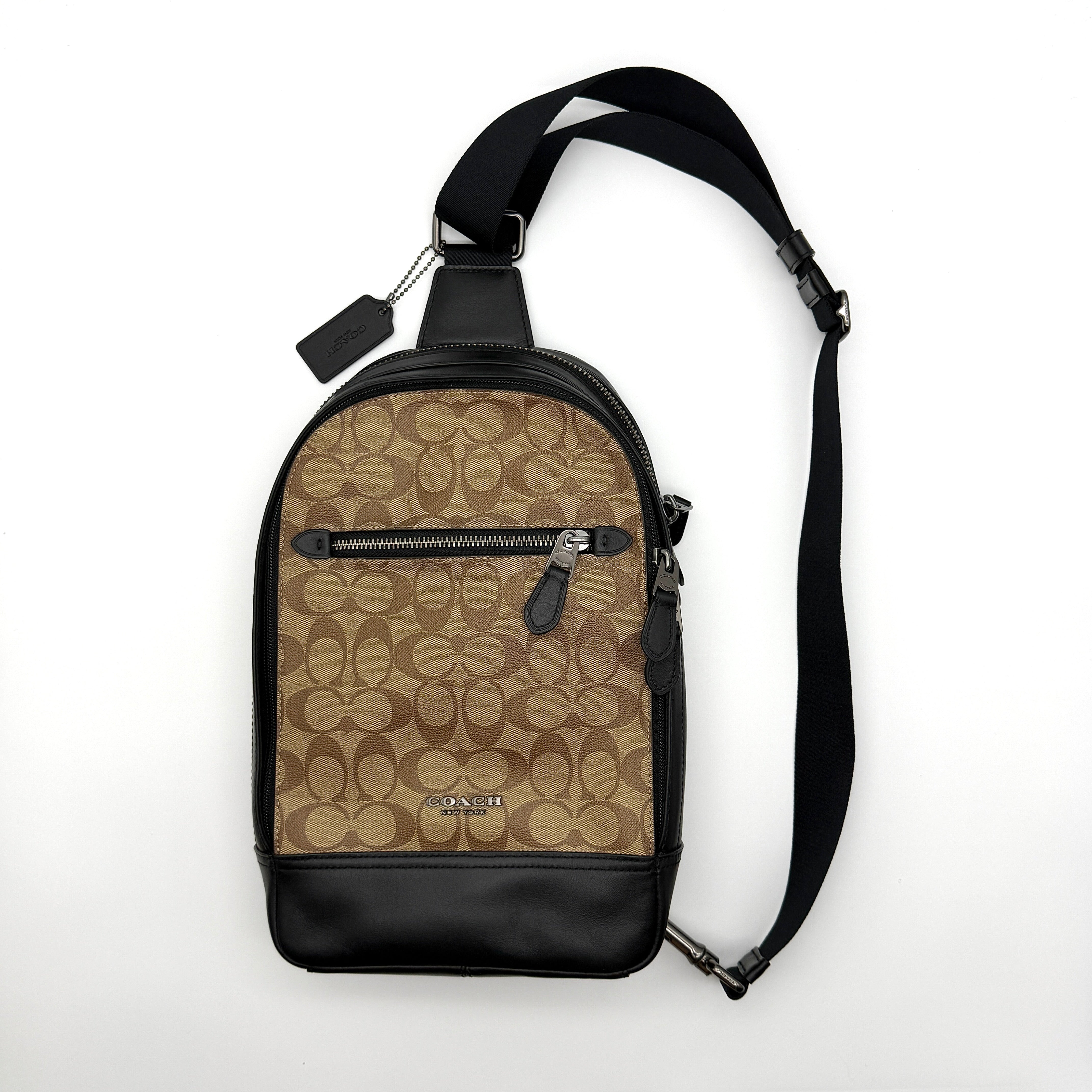 Coach Signature Graham Crossbody Bag in beige coated canvas with black leather trim and silver-tone hardware — pre-loved.