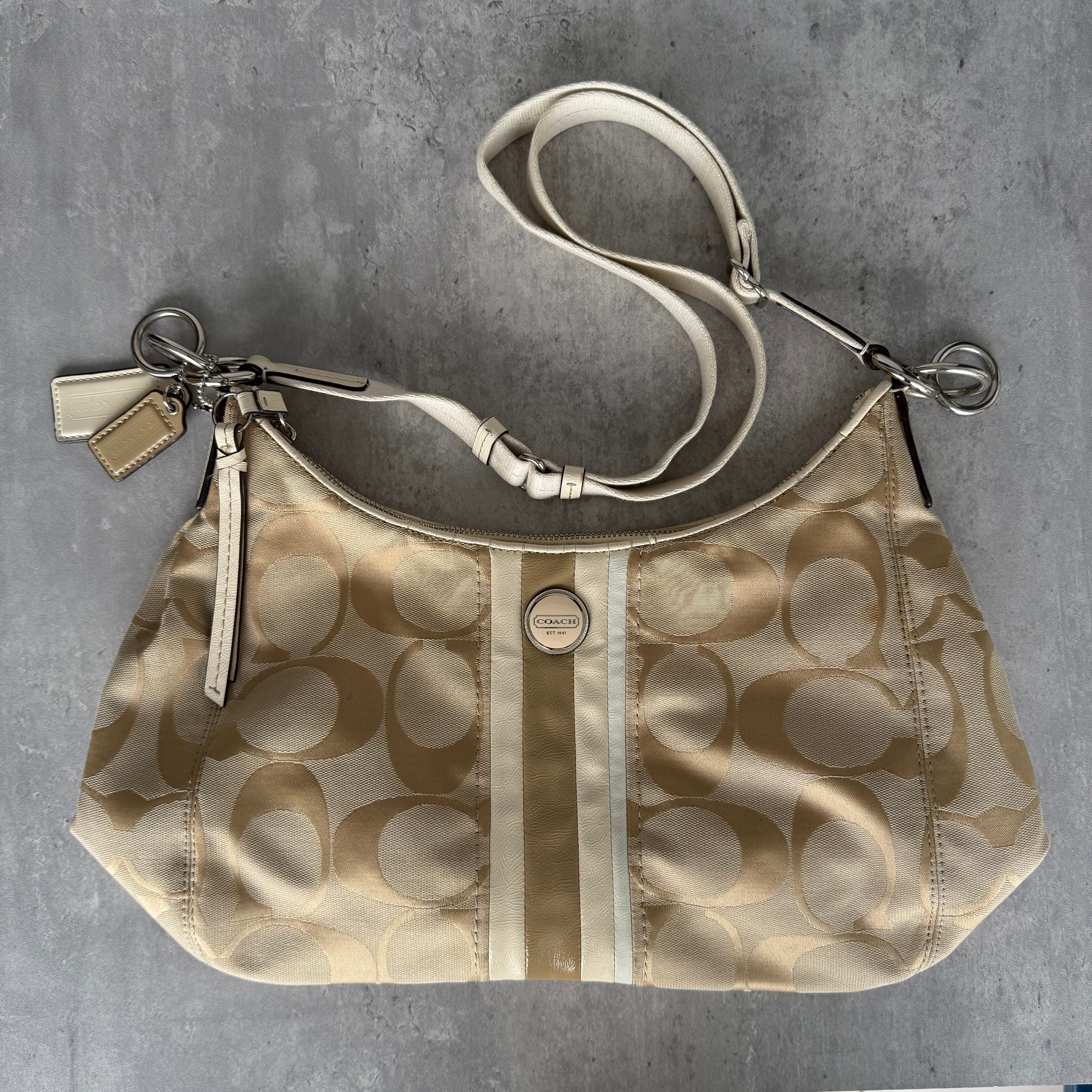 Coach Signature Stripe Convertible Hobo Bag Beige, with monogram canvas, cream leather trim, top zip, and dual strap options.