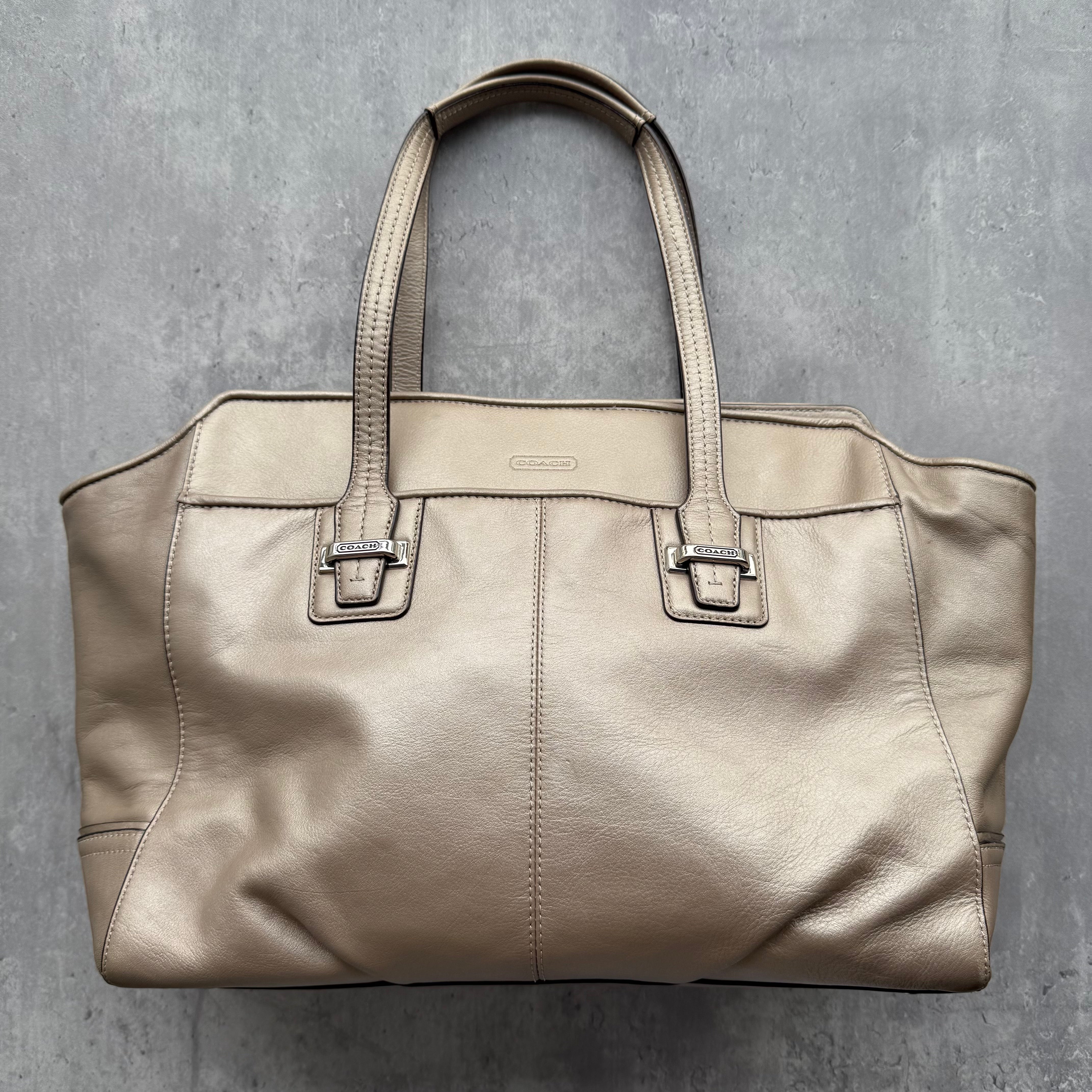 Coach Taylor Leather Alexis Carryall Shoulder Bag in beige leather with silver-tone hardware and dual rolled handles.