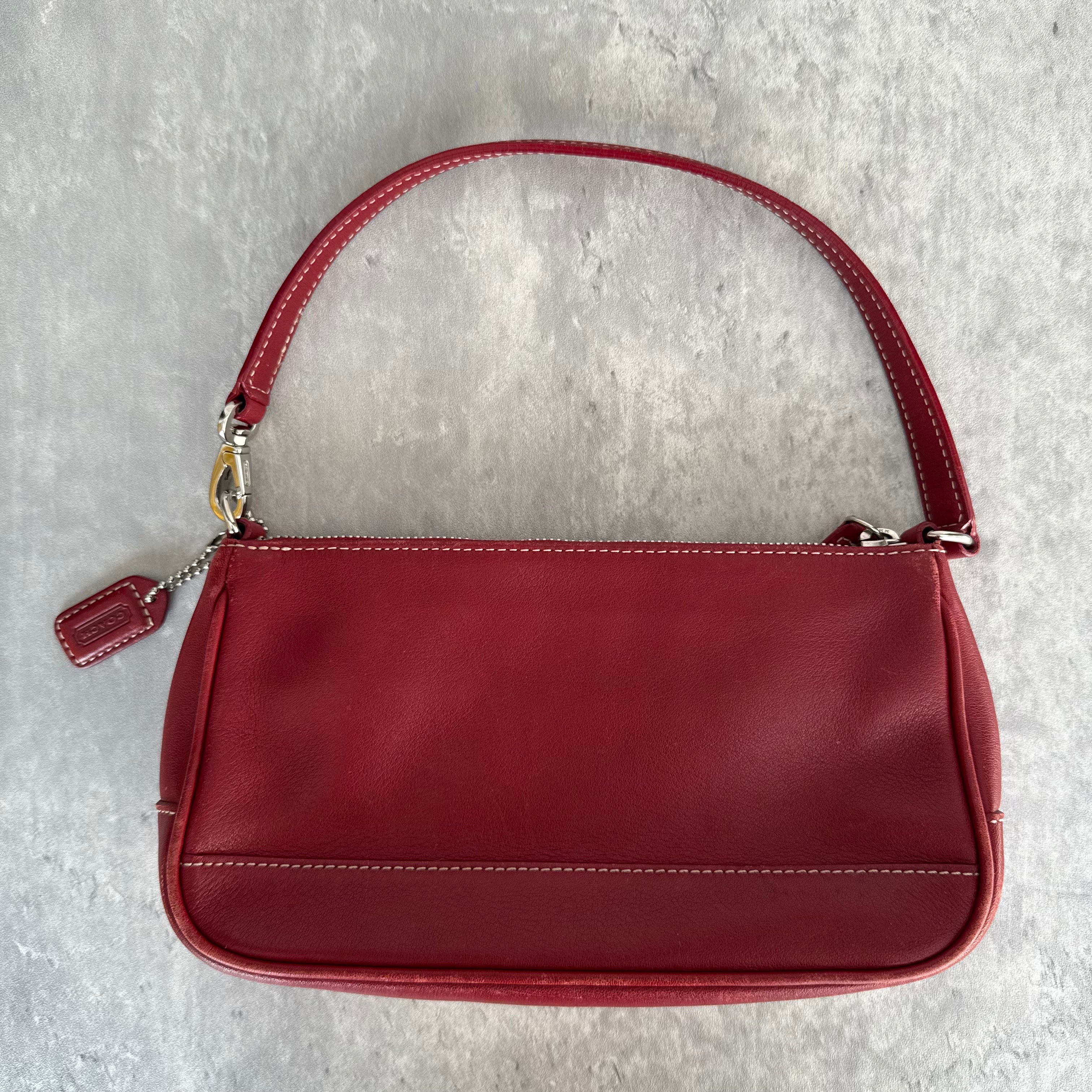 Coach Y2K Demi Shoulder Bag in red leather with silver hardware, white stitching, and zip closure