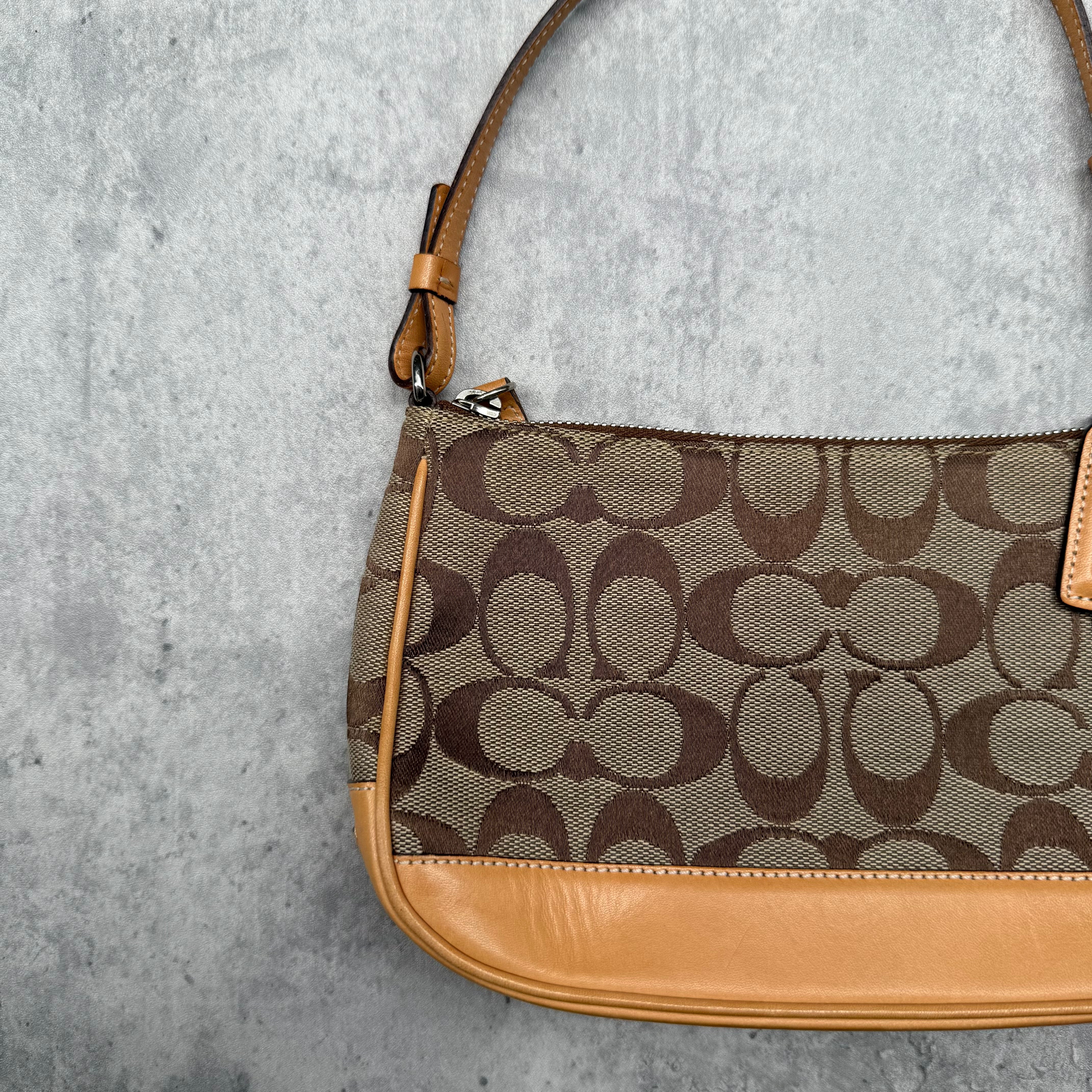 Coach Y2K Demi Shoulder Bag Tan, featuring signature monogram canvas, tan leather trim, and orange fabric interior with silver-tone hardware.