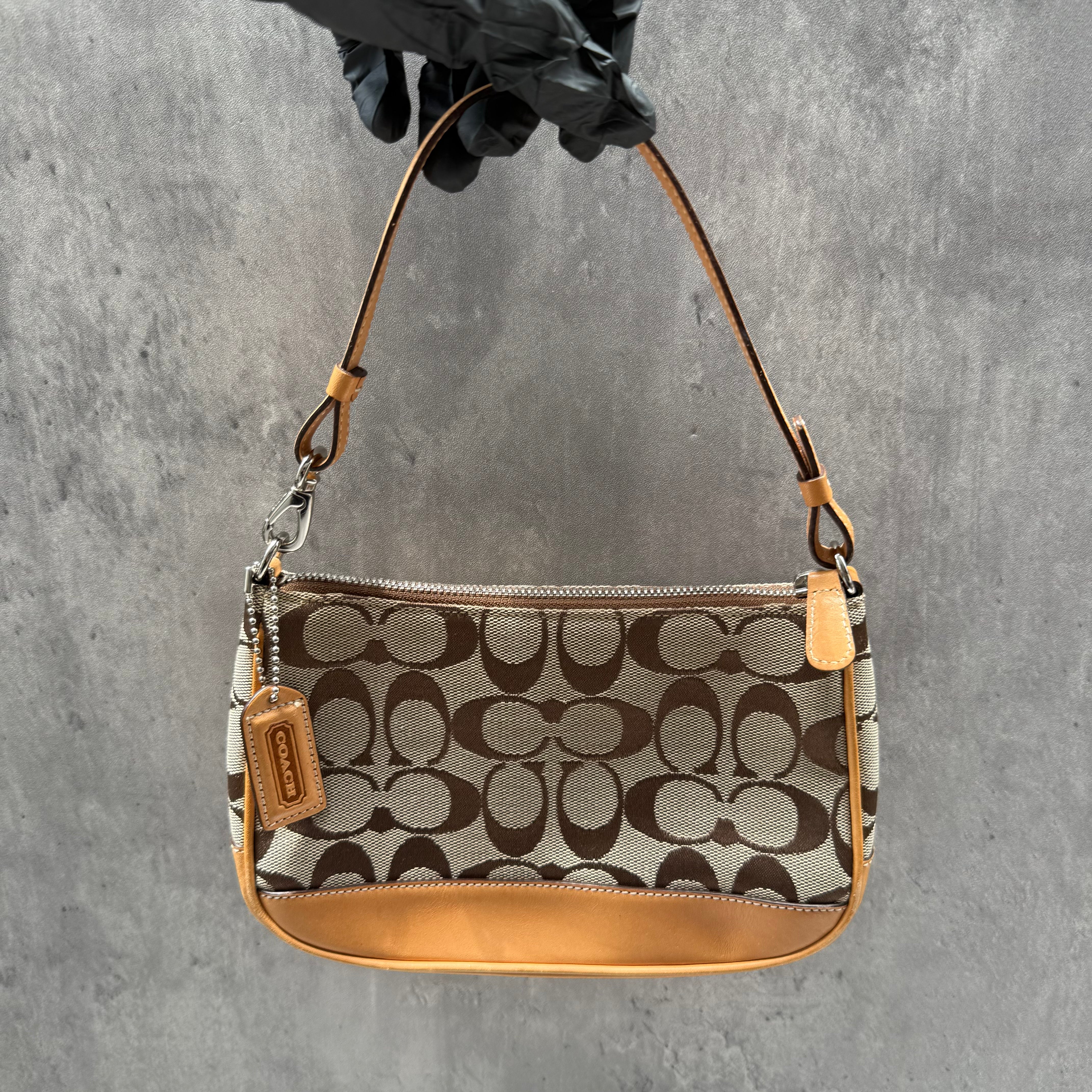 Coach Y2K Demi Shoulder Bag Tan, featuring signature monogram canvas, tan leather trim, and orange fabric interior with silver-tone hardware.