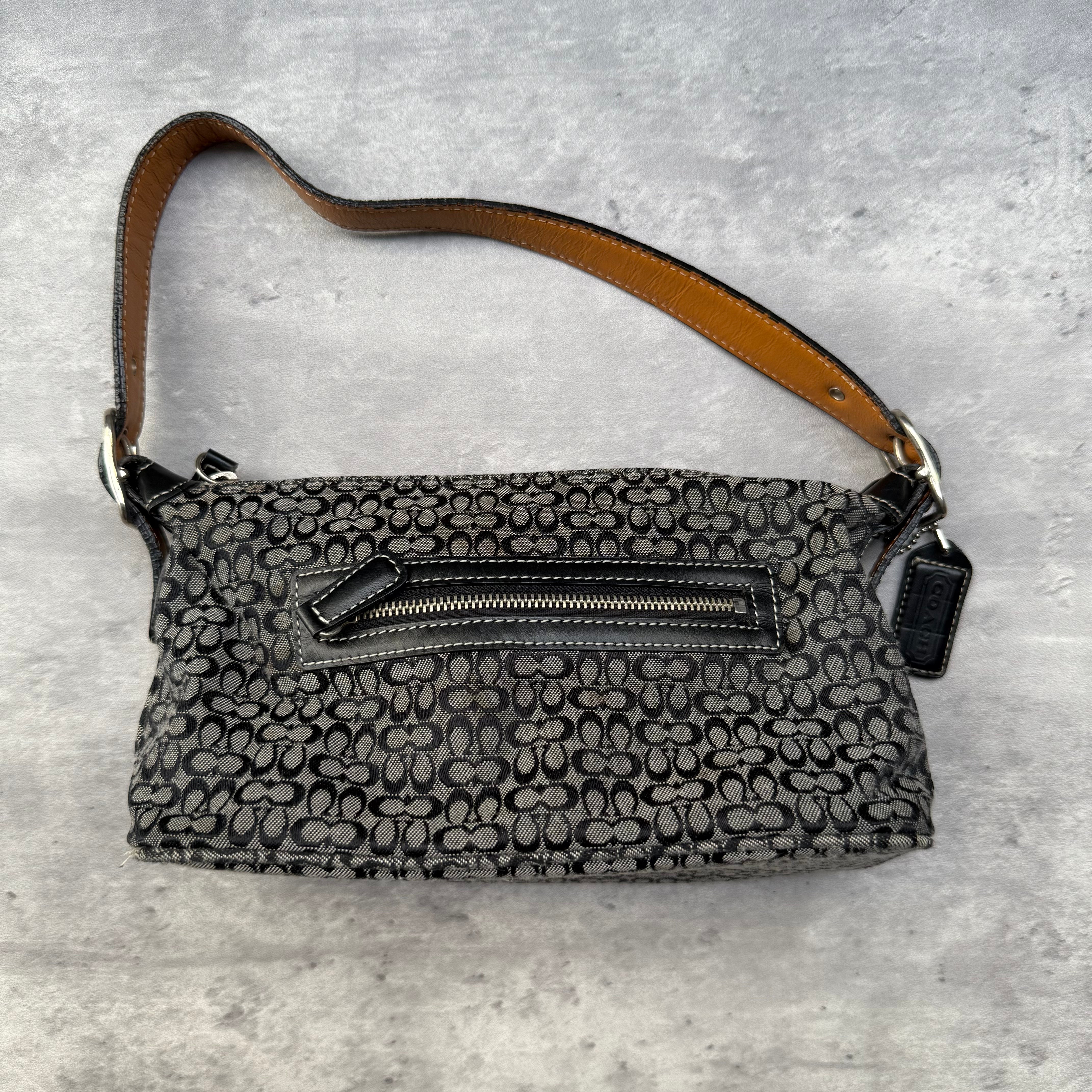 Coach Y2K Signature Hobo Shoulder Bag in grey and black monogram canvas with tan leather strap.