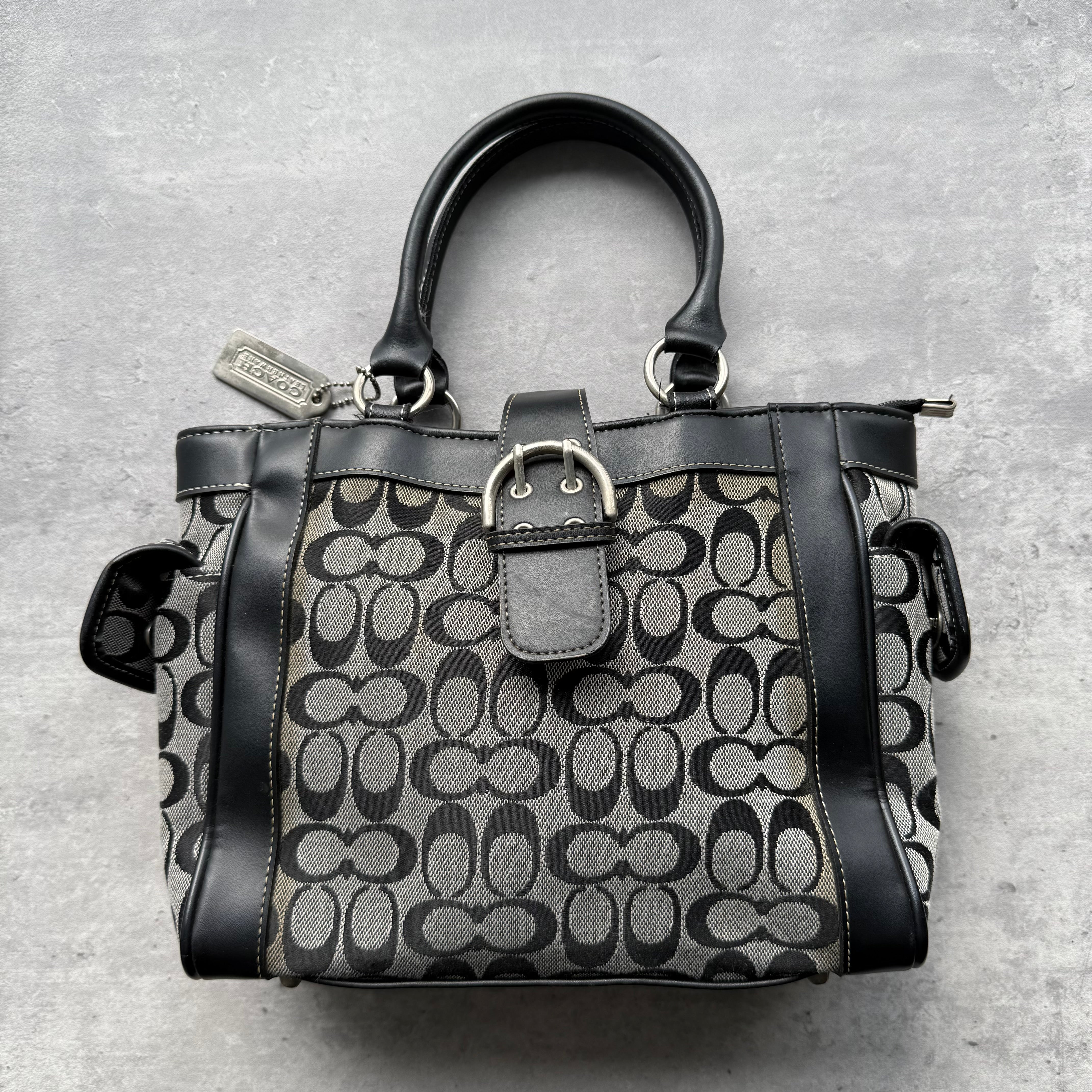 Coach Y2K Soho Buckle Tote Bag in grey and black signature jacquard with leather trim and silver-tone hardware.