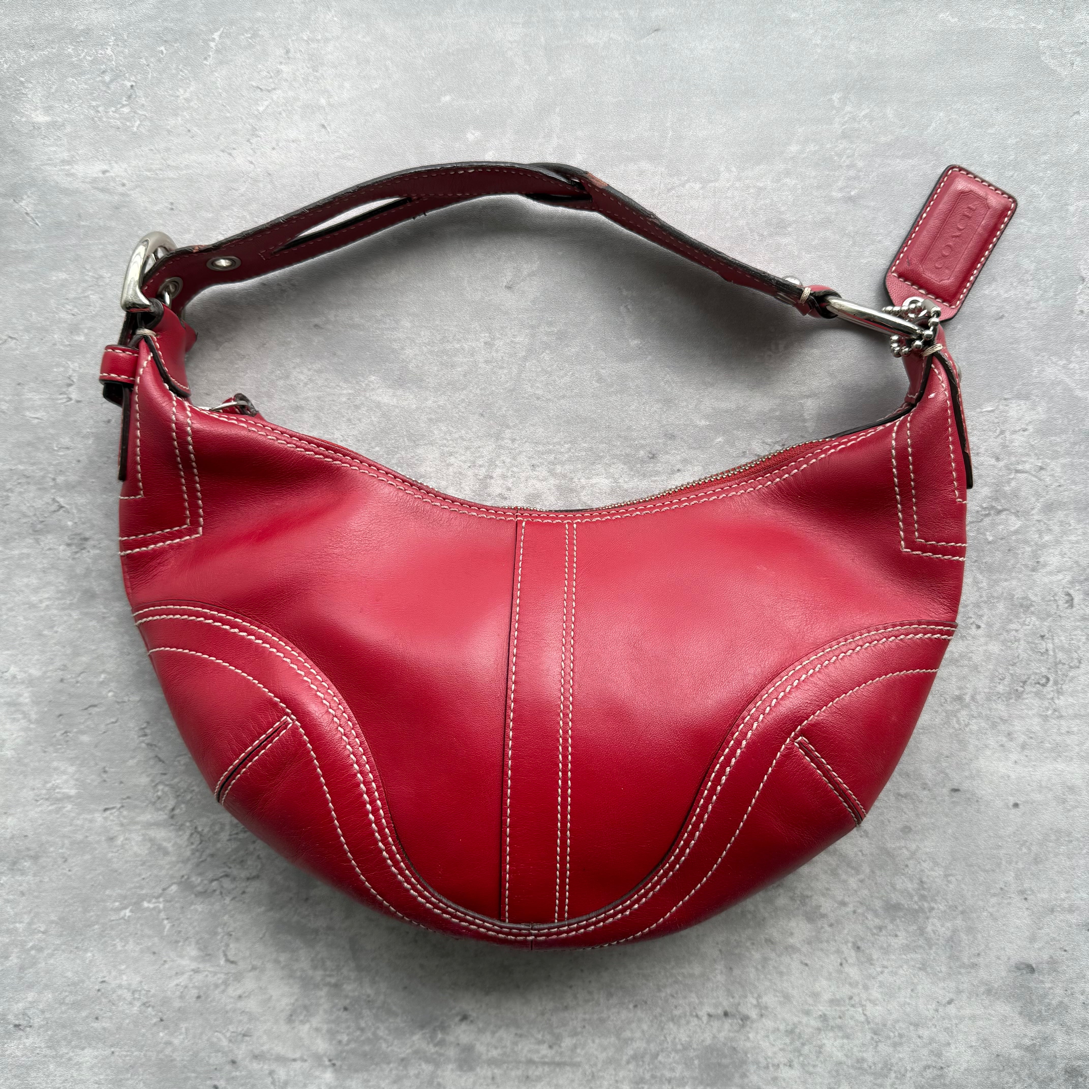 Coach Y2K Soho Hobo Shoulder Bag in red leather with contrast white stitching and silver-tone hardware.