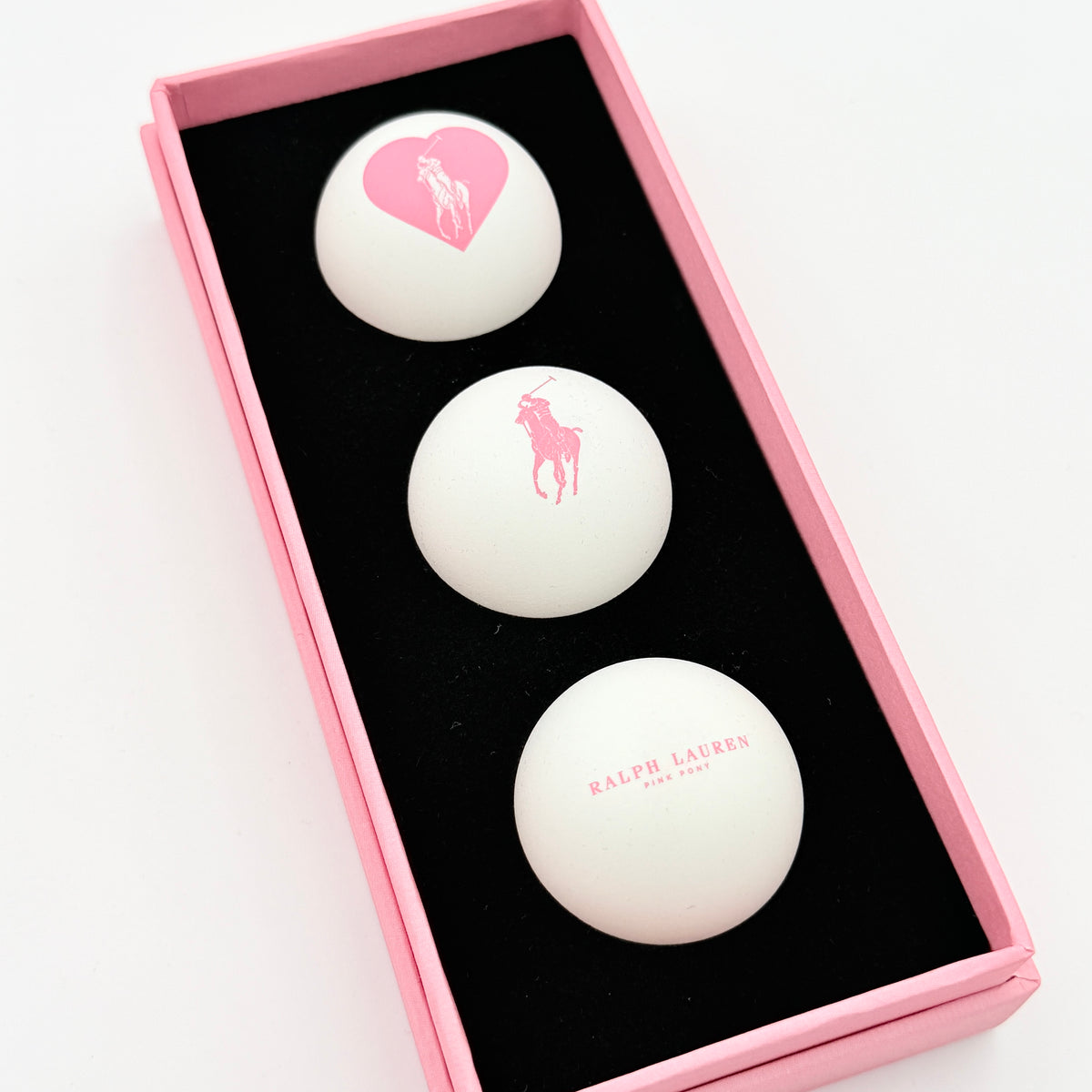 Ralph Lauren Pink Pony table tennis balls set of three, presented in a pink gift box with signature Polo designs.