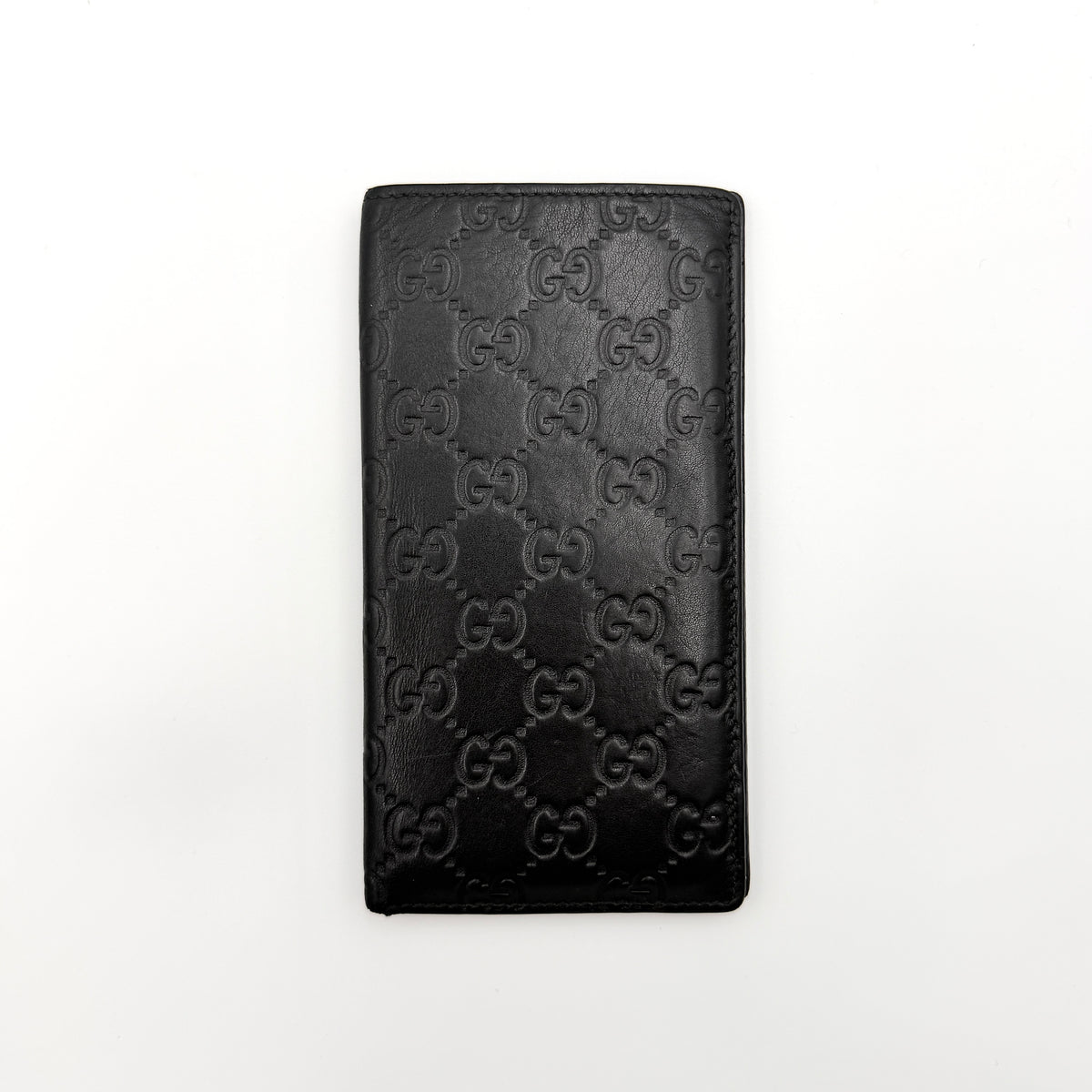 Gucci Guccissima GG embossed long wallet in black leather with box and care card.
