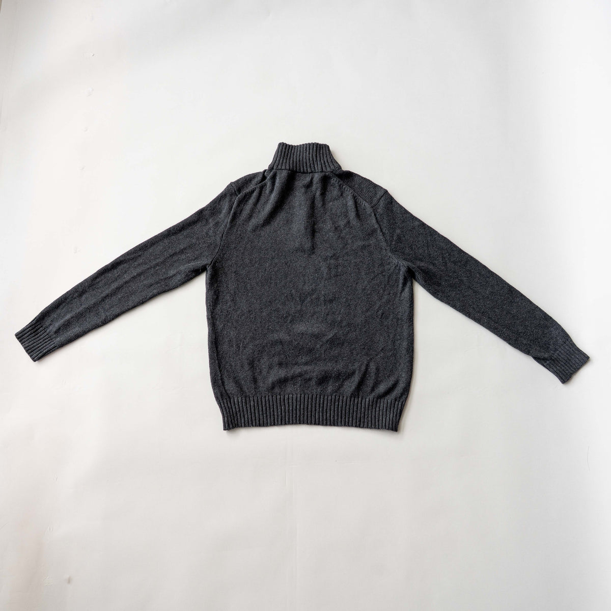 Dark grey Polo Ralph Lauren quarter zip mockneck pullover sweater with ribbed collar and green pony logo.