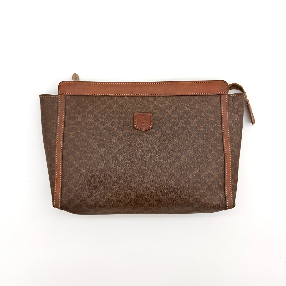 Celine Triomphe Macadam Clutch Bag in brown coated canvas with leather trim, photographed on a white background.