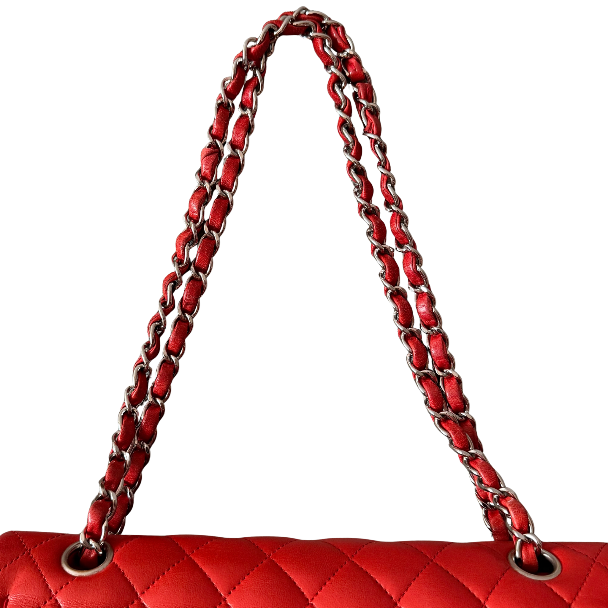 Chanel double flap shoulder bag in quilted red leather with silver-tone hardware and chain leather strap.