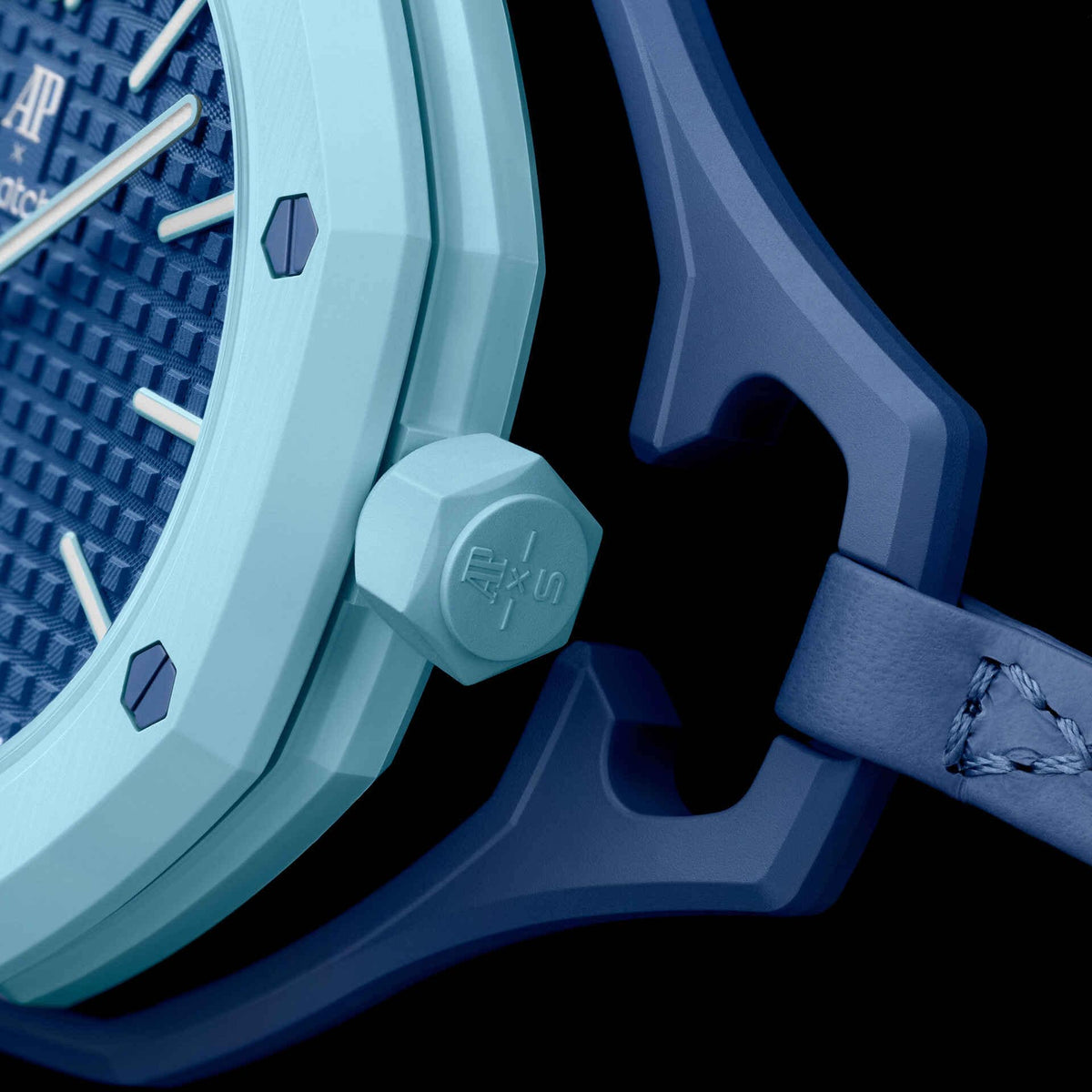 A Swatch x Audemars Piguet Royal Pop Lan Ba pendant watch in blue, featuring a geometric case, textured dial, and stitched blue strap.