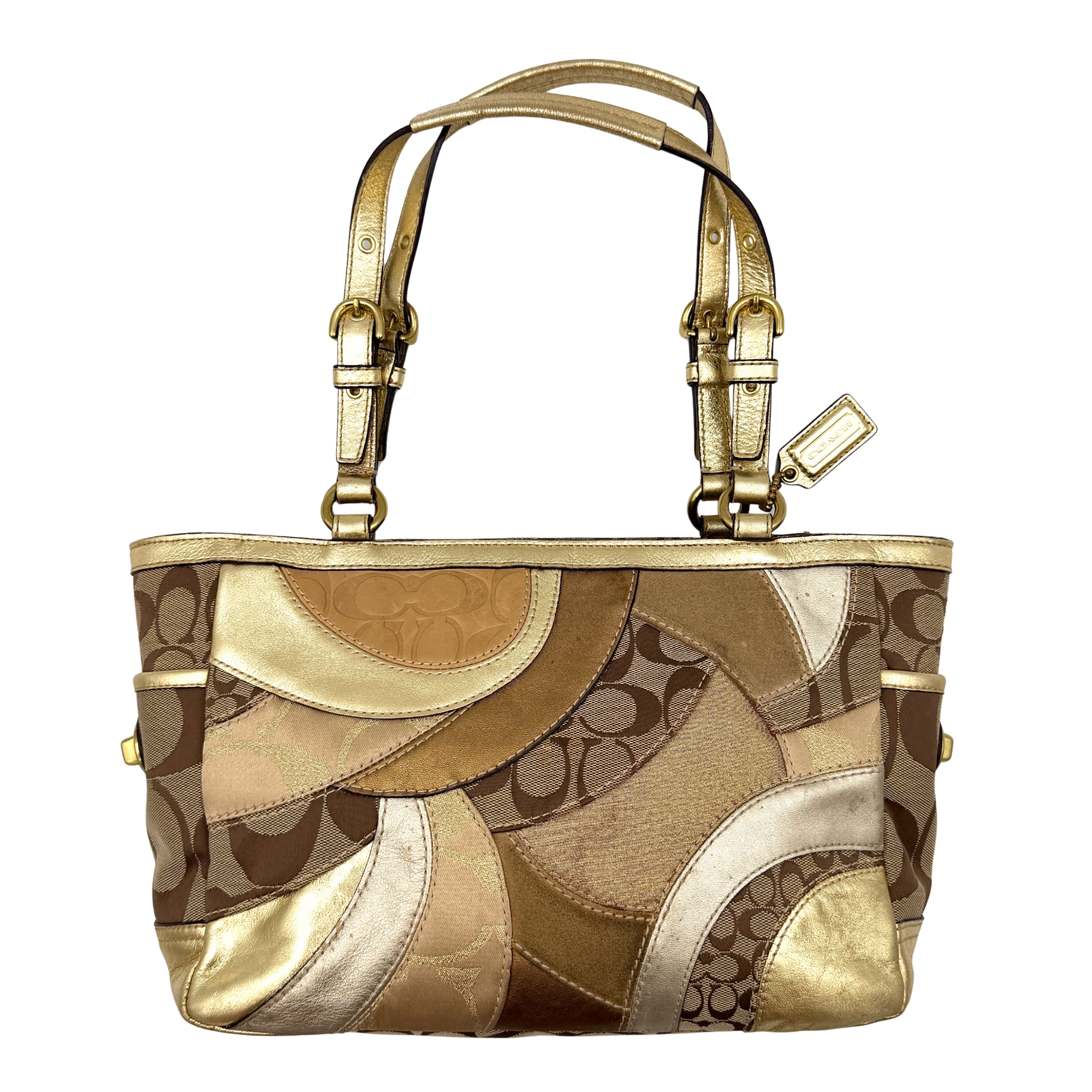 Coach Gallery Tote in a geometric patchwork of gold, beige, and tan with signature monogram and metallic leather against a white background.