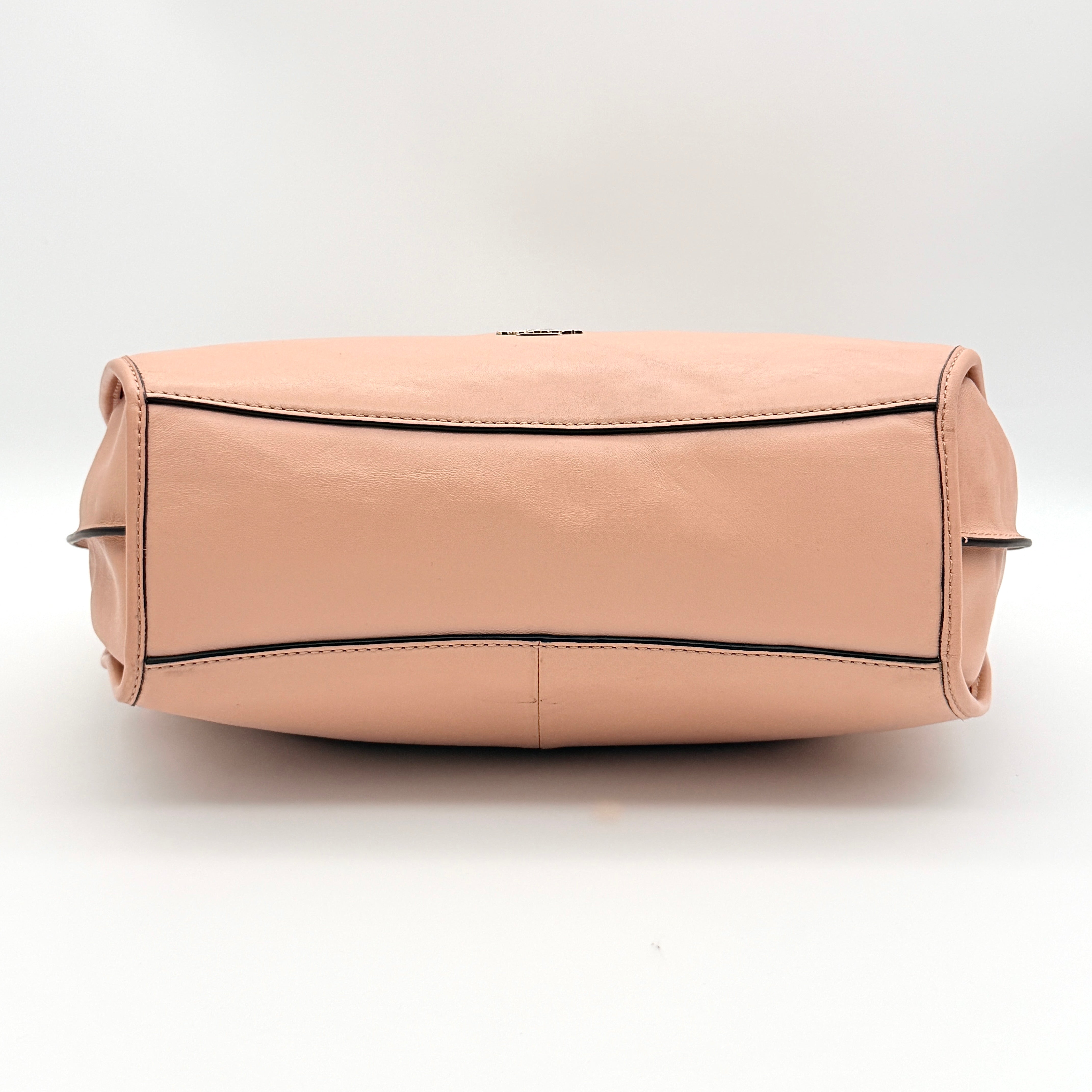 Coach Madison Smythe Satchel in blush pink leather with gold-tone hardware and detachable strap.