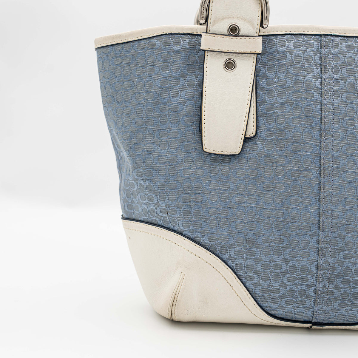Coach Y2K Signature Soho Buckle Tote in light blue jacquard with white leather trim and silver-tone hardware.