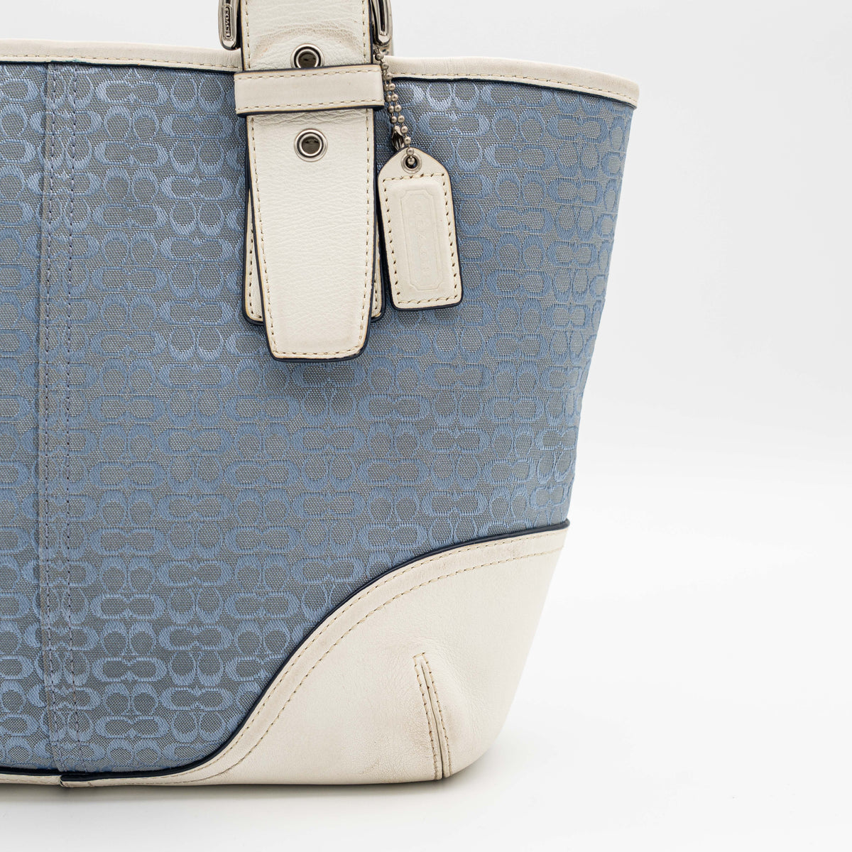 Coach Y2K Signature Soho Buckle Tote in light blue jacquard with white leather trim and silver-tone hardware.
