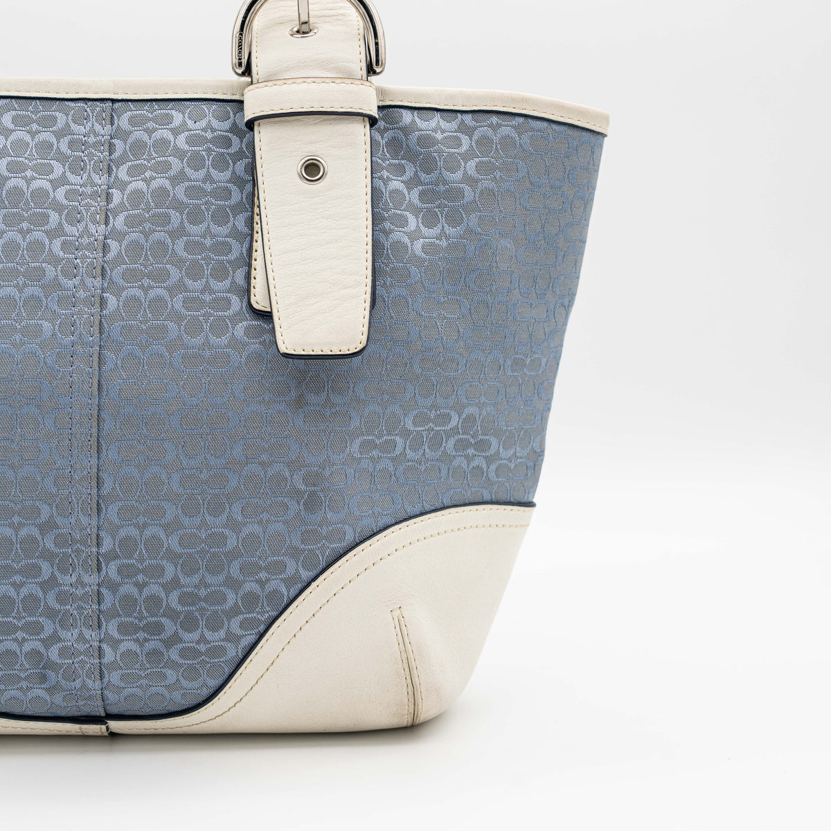 Coach Y2K Signature Soho Buckle Tote in light blue jacquard with white leather trim and silver-tone hardware.