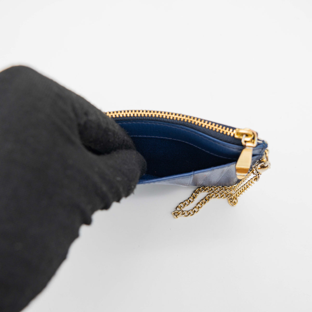 Samantha Thavasa Sports Mickey Collection card case in ivory and blue with gold chain and playful Mickey Mouse sports illustrations.