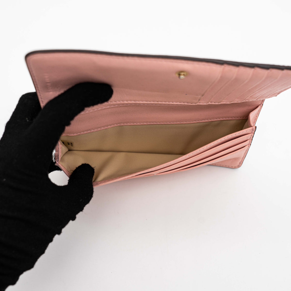 The Tory Burch Hicks Garden Party Wallet in multi-colour coated canvas with intricate floral print and gold logo detail.
