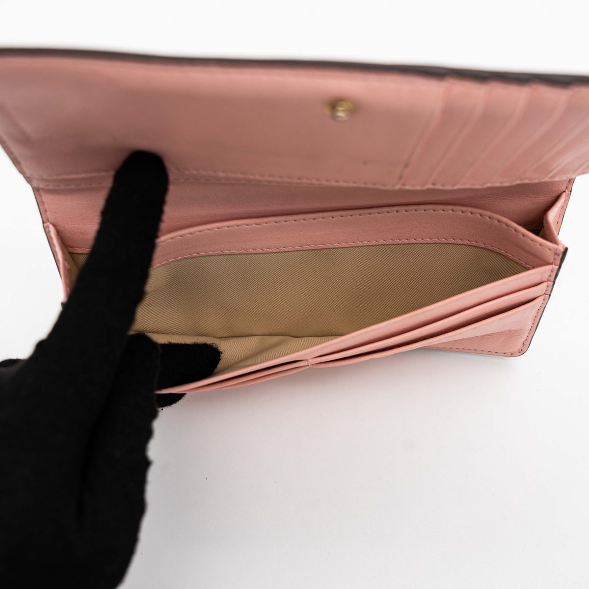 The Tory Burch Hicks Garden Party Wallet in multi-colour coated canvas with intricate floral print and gold logo detail.