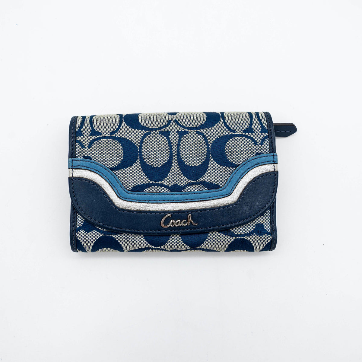 Coach Signature Ashley compact wallet in blue jacquard with leather trim, featuring a silver logo and organized interior.